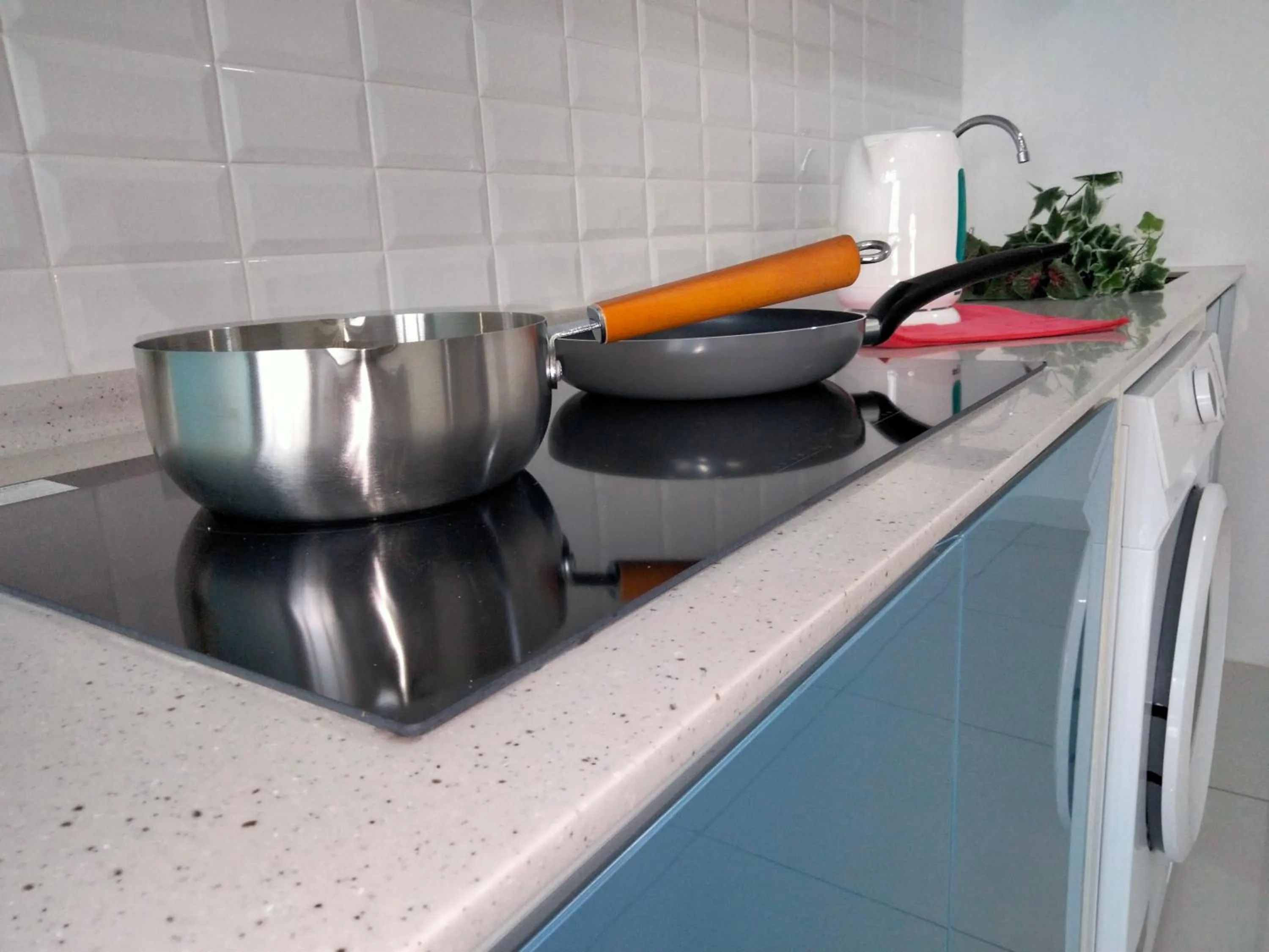 kitchen in Continew Residence by HomeBrickz