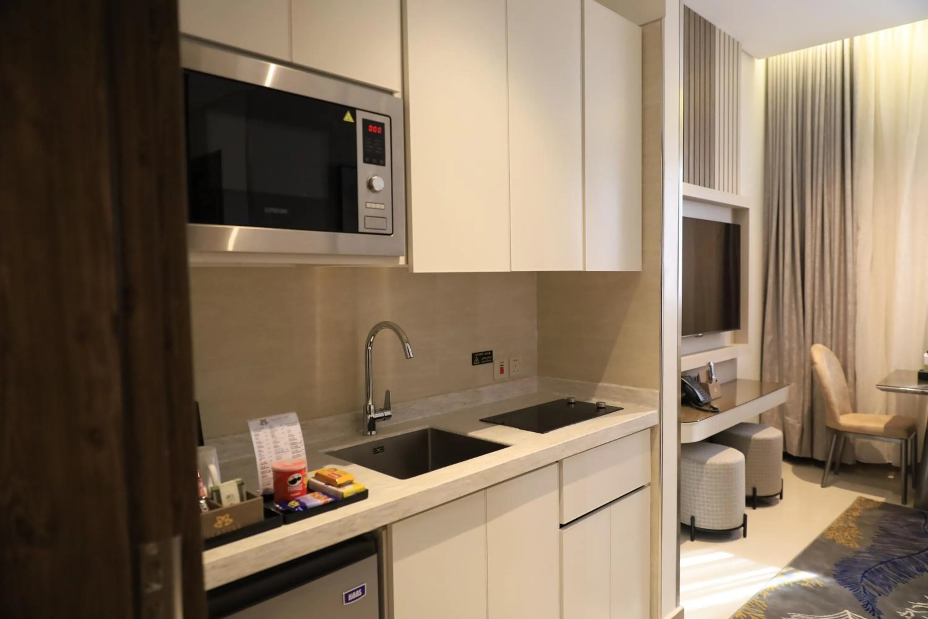 Kitchen or kitchenette in Rukn Mawasim Serviced Apartments