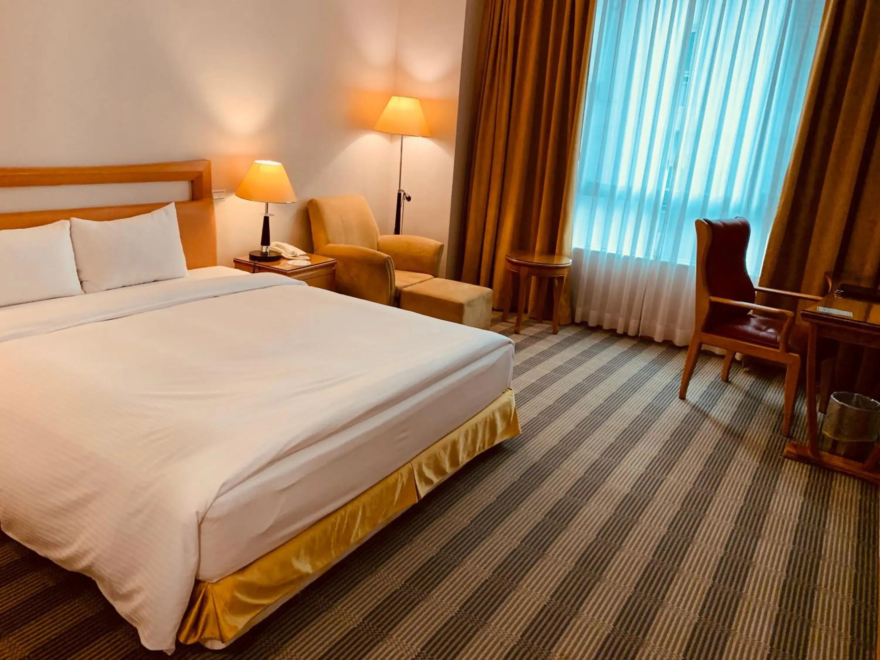 Bed in Kai Du Hotel Bed in Kai Du Hotel