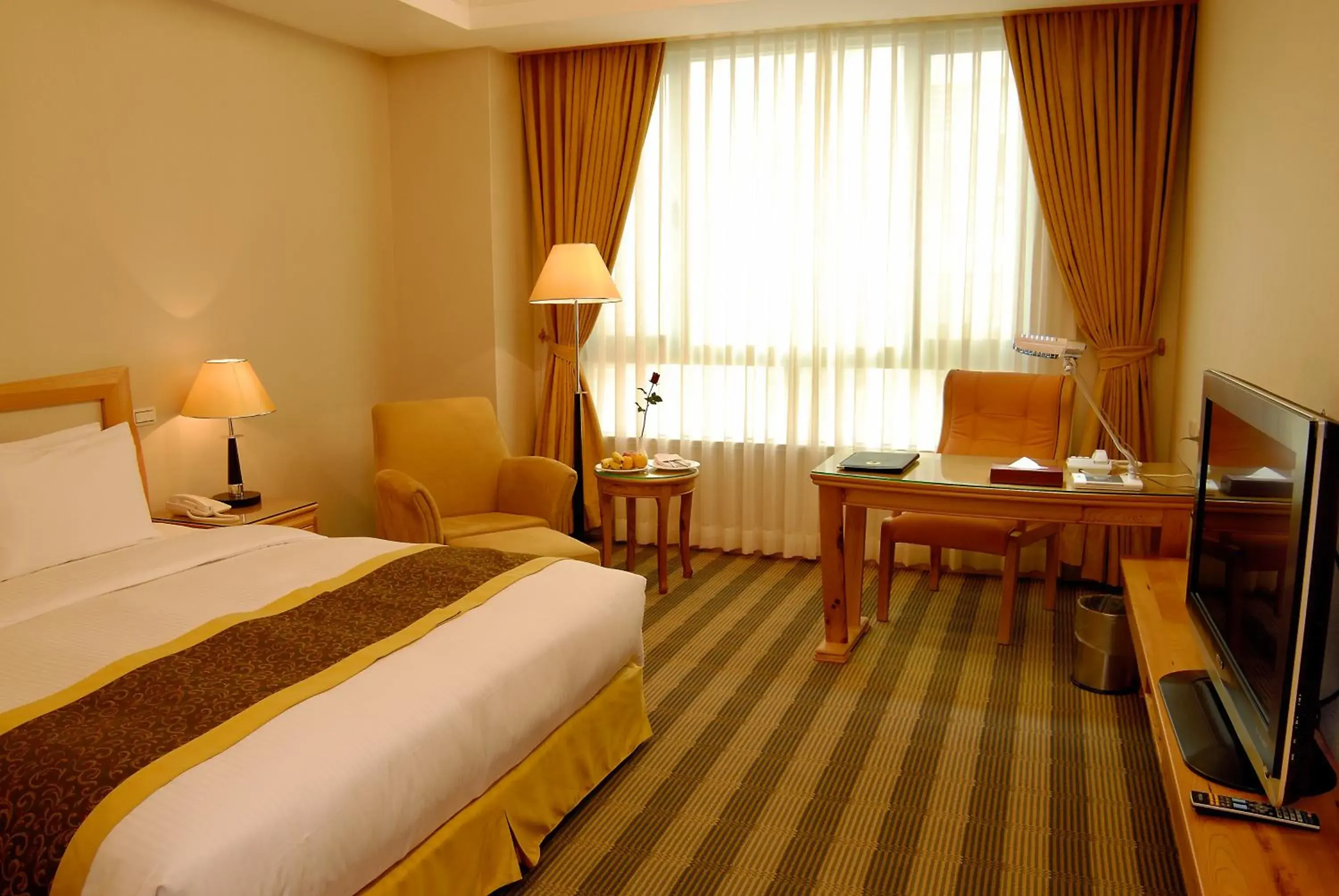 Bed in Kai Du Hotel Bed in Kai Du Hotel