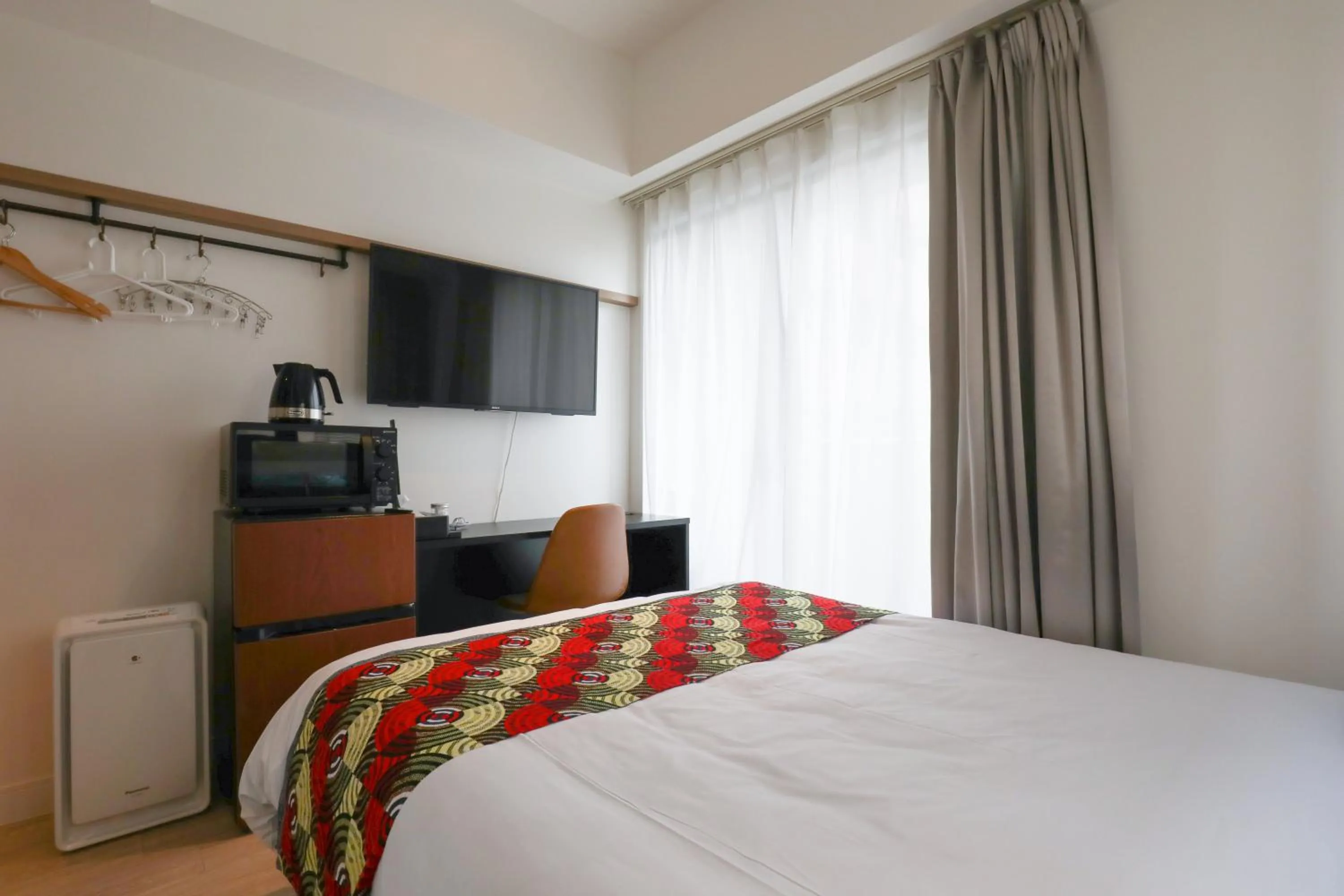 Bed in FFFFFF Hotel エフホテル