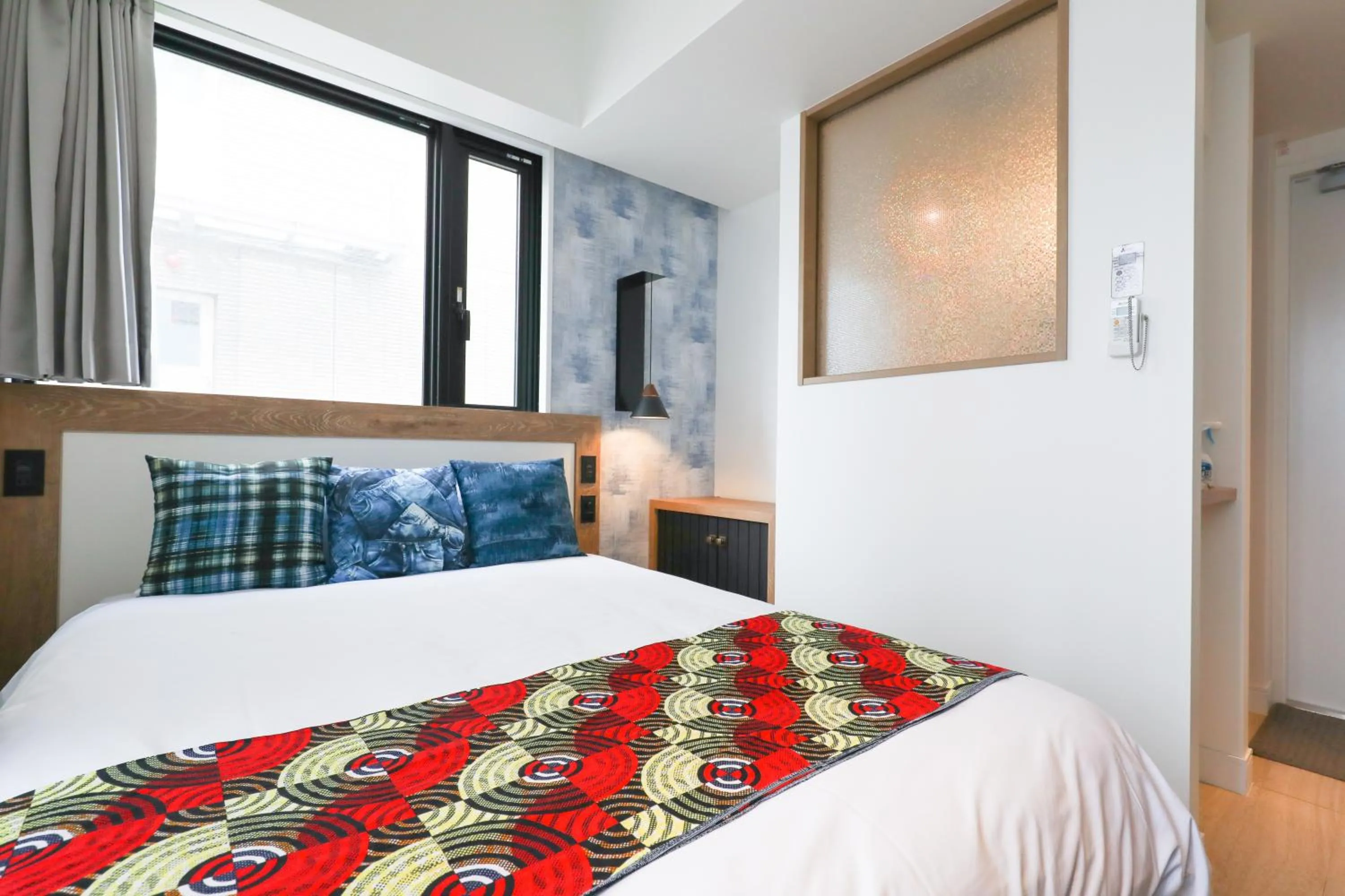 Bed in FFFFFF Hotel エフホテル