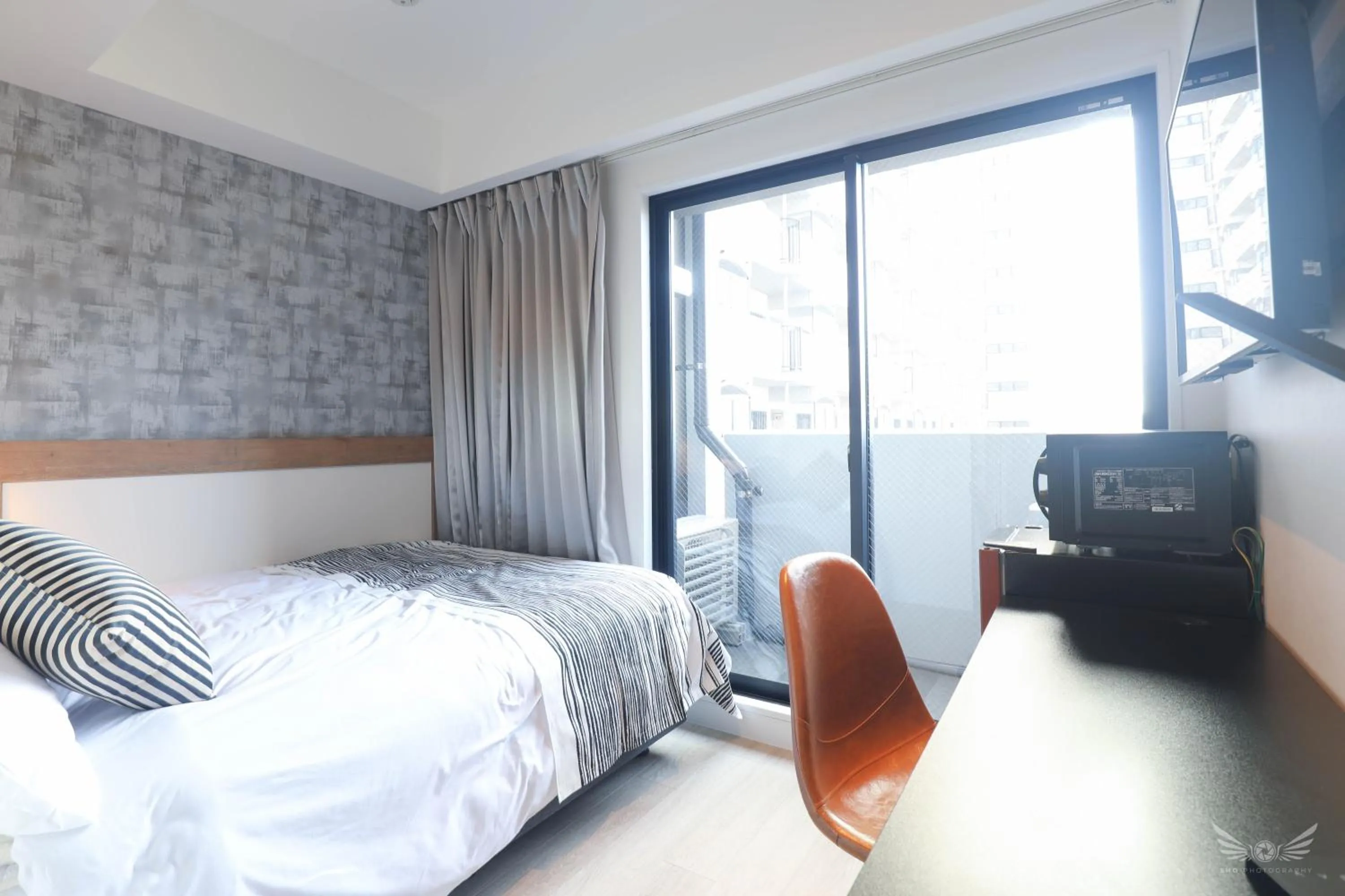 Bed in FFFFFF Hotel エフホテル