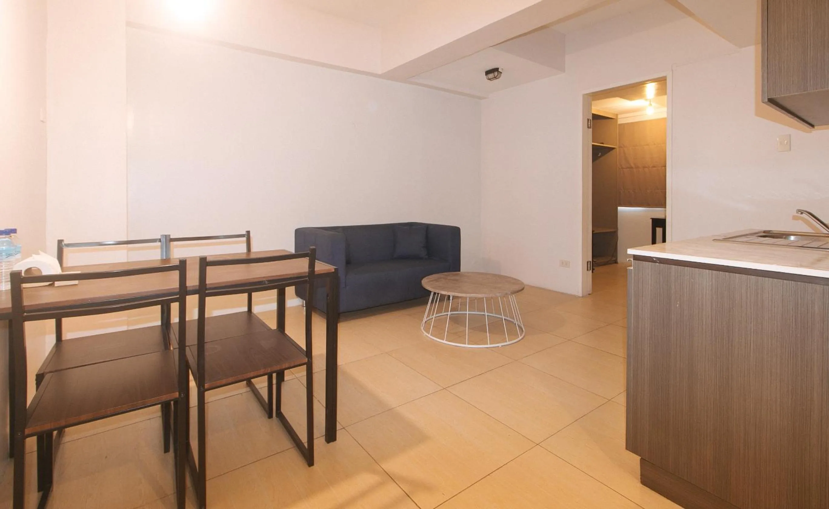 Seating area in 59 Xavierville by RedDoorz