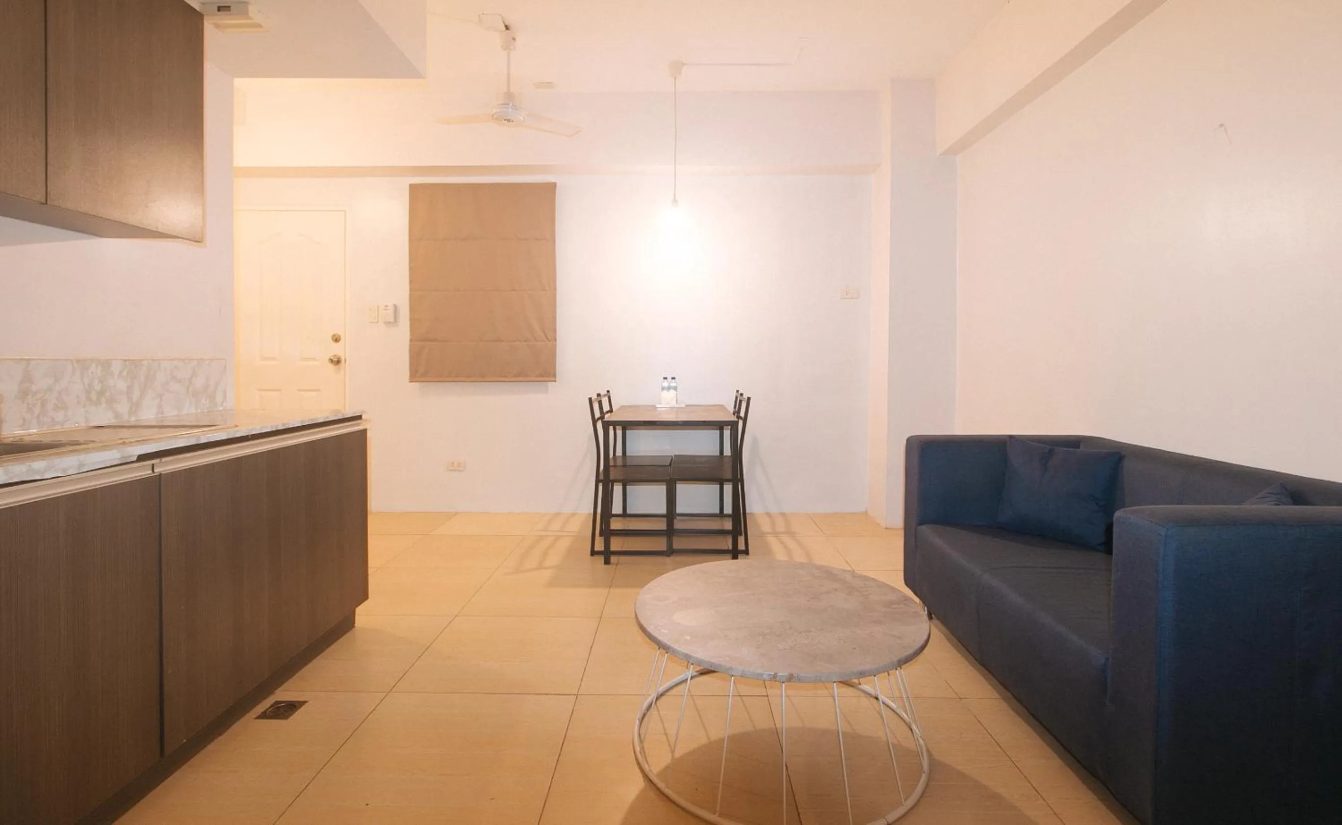 Seating area in 59 Xavierville by RedDoorz