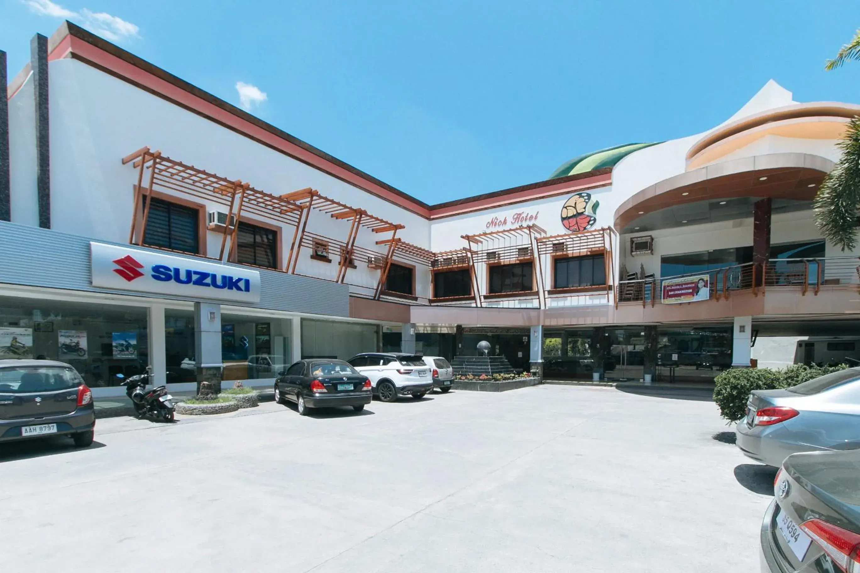 Property building in RedDoorz Premium @ Nick Hotel Gerona Tarlac Property building in RedDoorz Premium @ Nick Hotel Gerona Tarlac