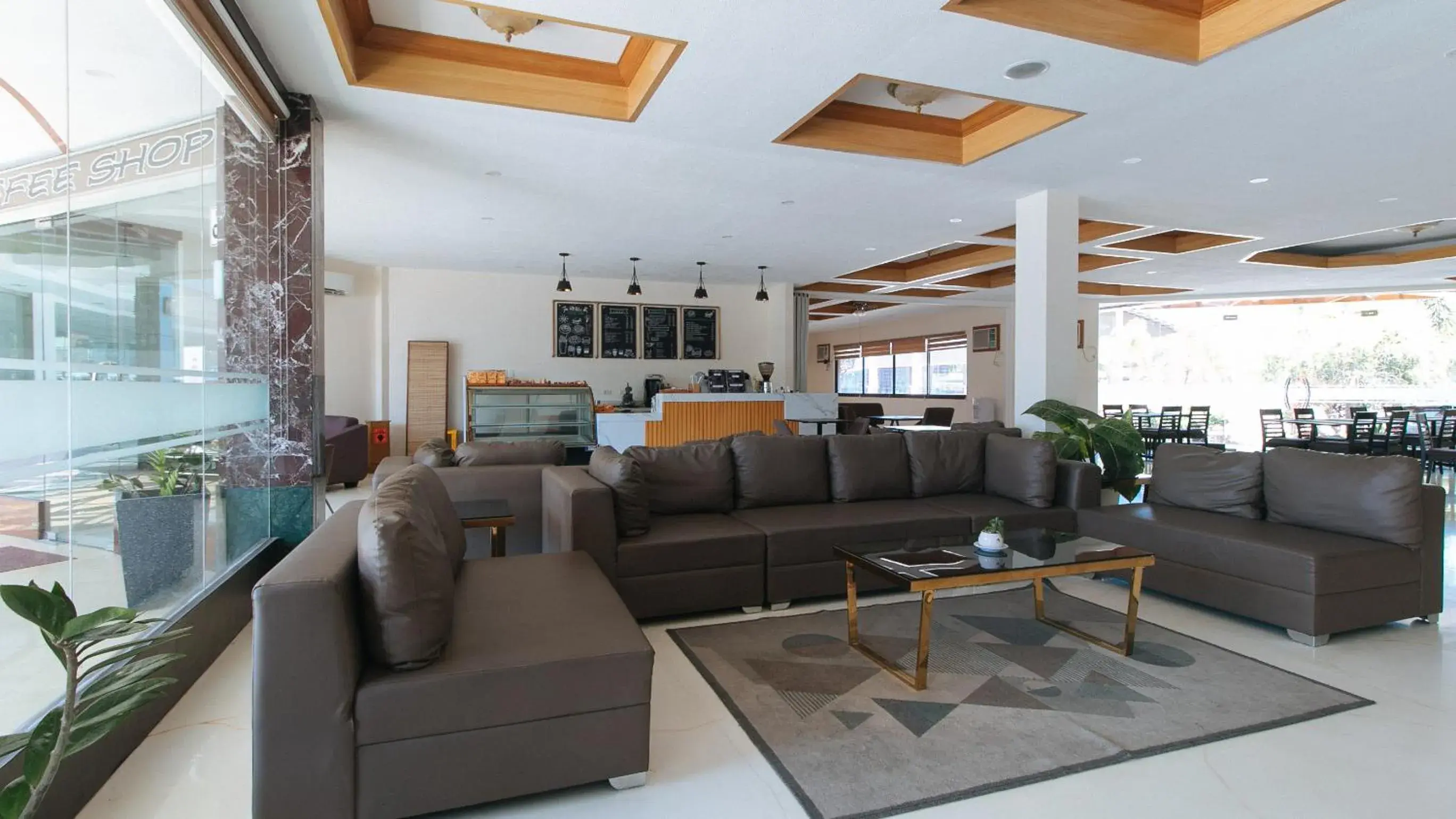 Living room in RedDoorz Premium @ Nick Hotel Gerona Tarlac Living room in RedDoorz Premium @ Nick Hotel Gerona Tarlac