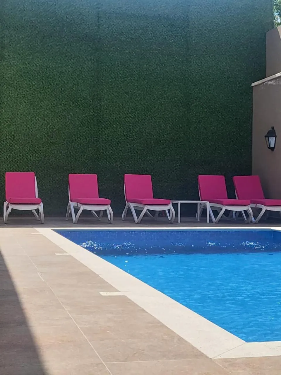 Swimming pool in Ambassador, a Boutique Hotel