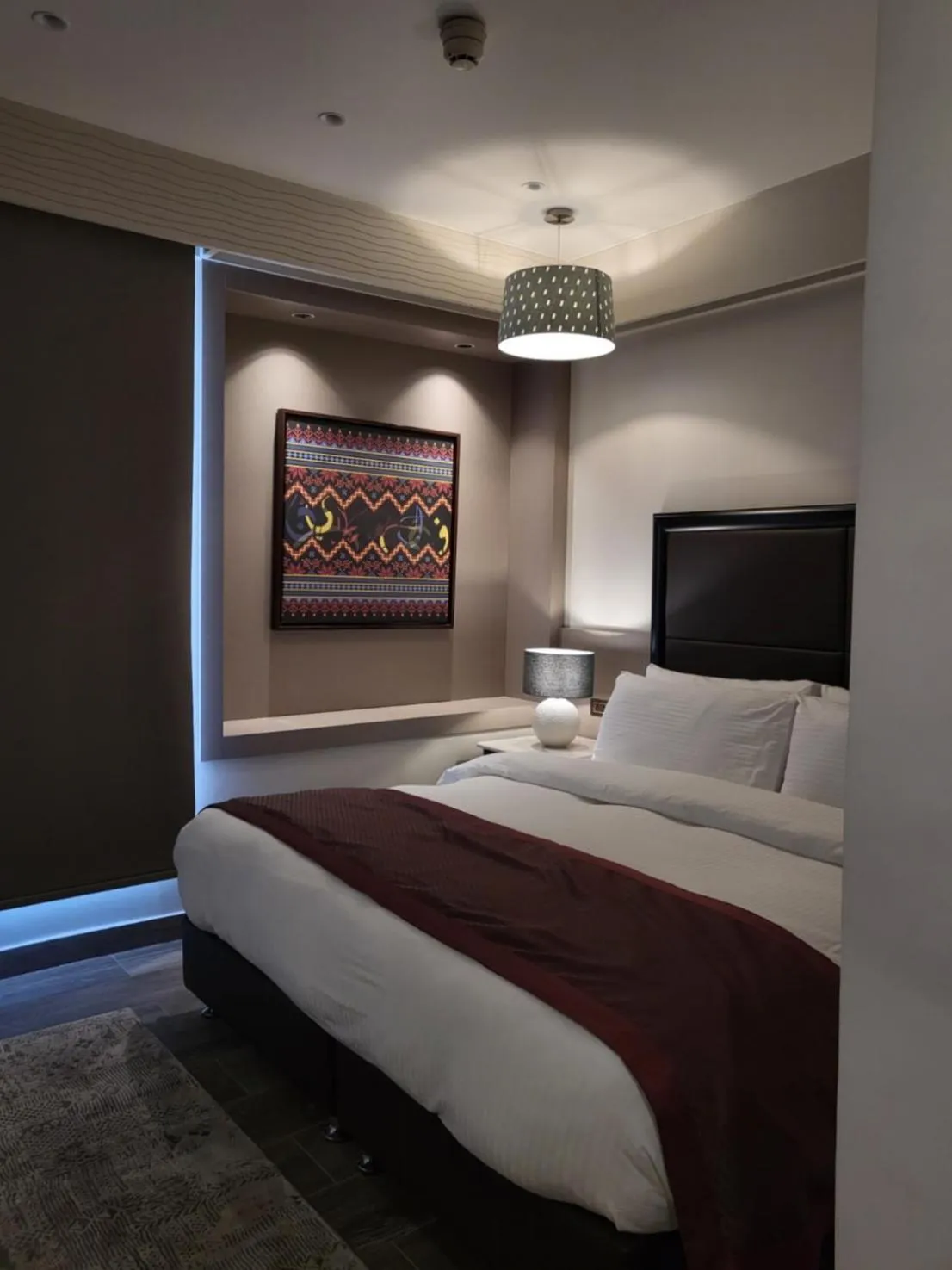 Bed in Ambassador, a Boutique Hotel