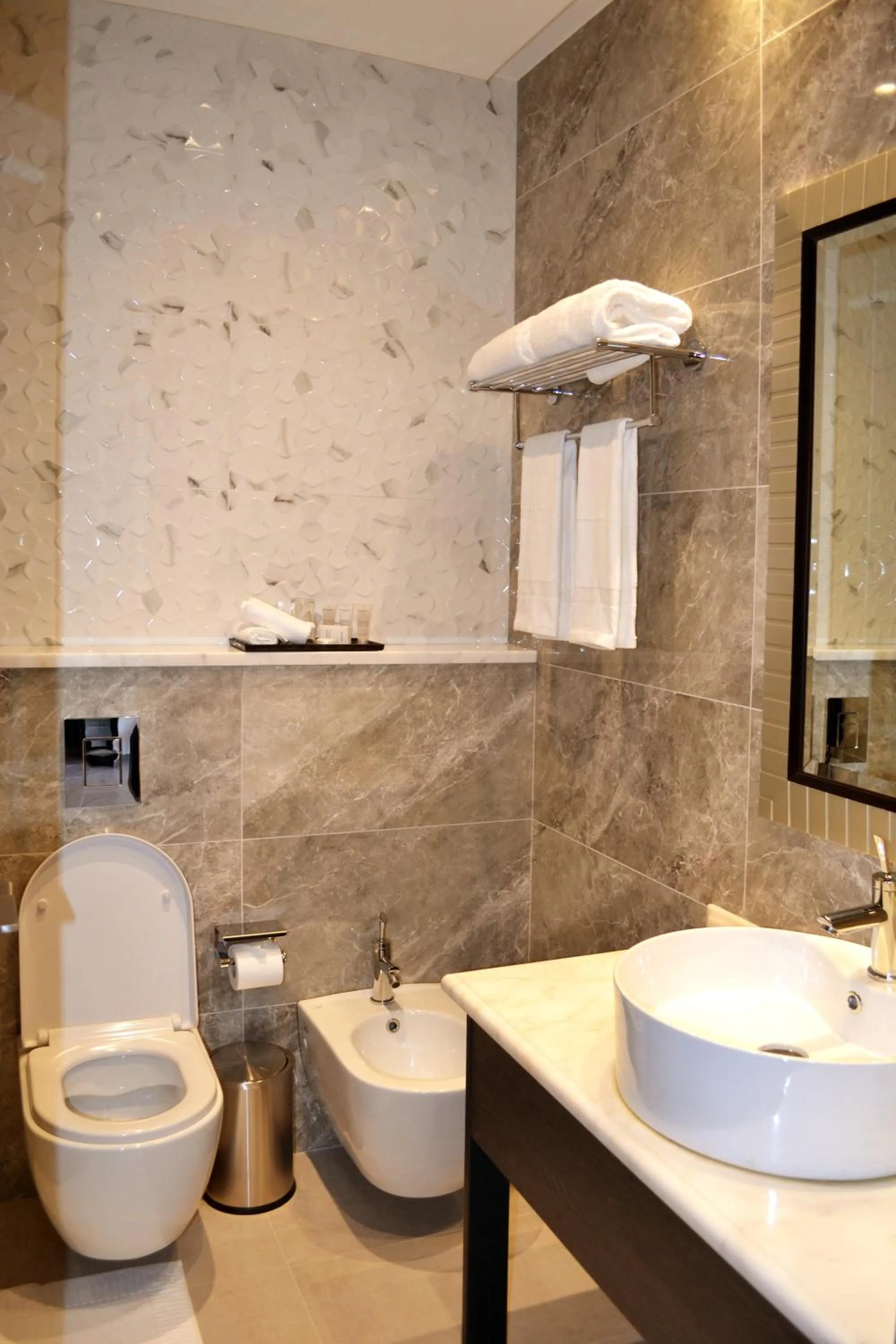 Bathroom in Ambassador, a Boutique Hotel