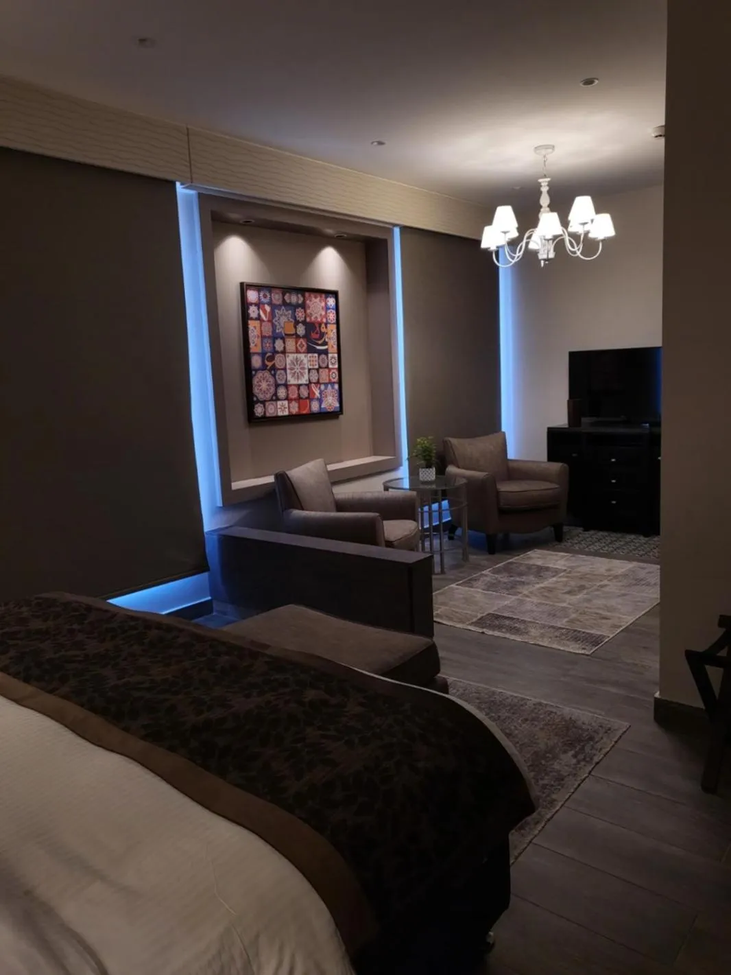 Communal lounge/ TV room, Bed in Ambassador, a Boutique Hotel