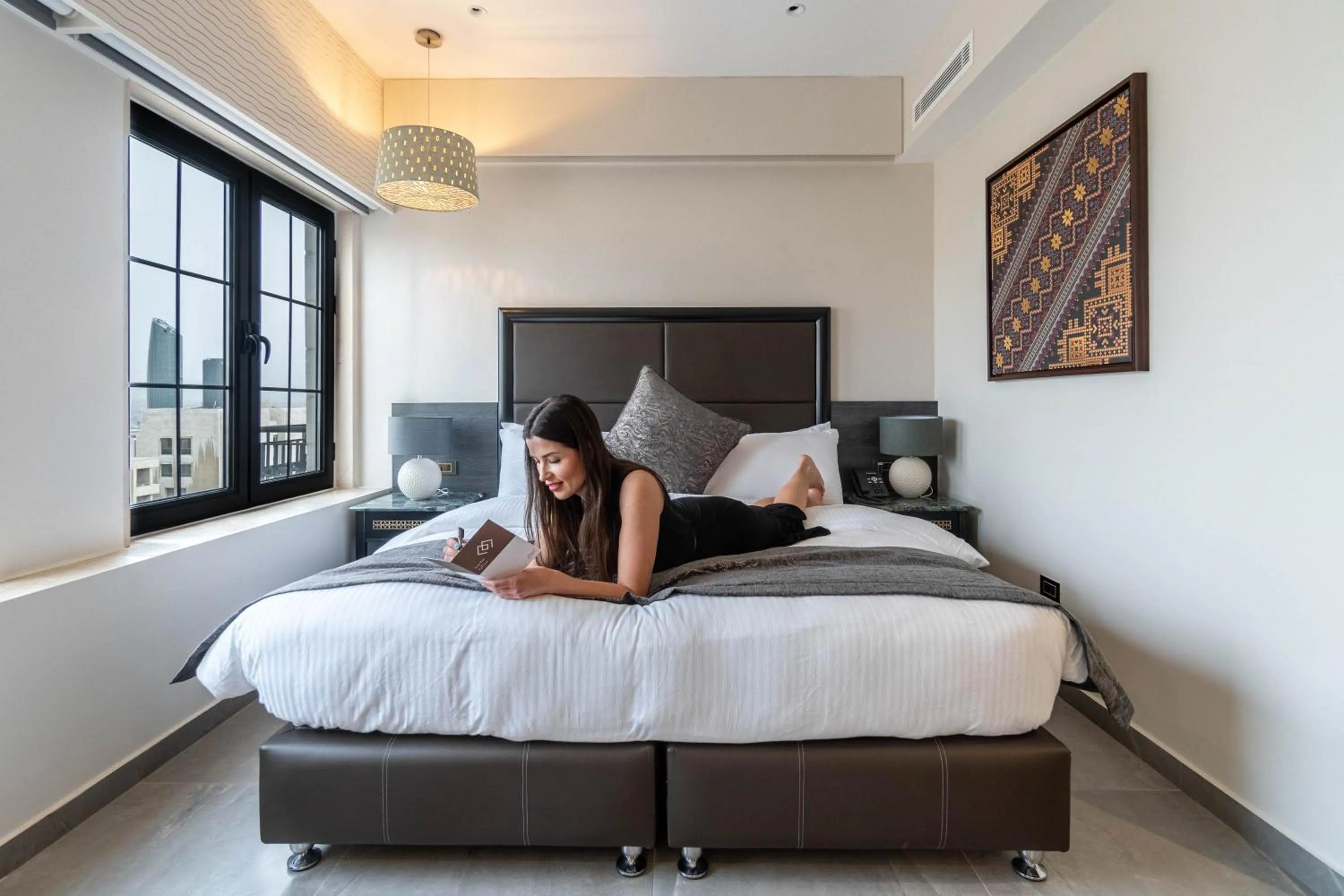 Property building, Bed in Ambassador, a Boutique Hotel