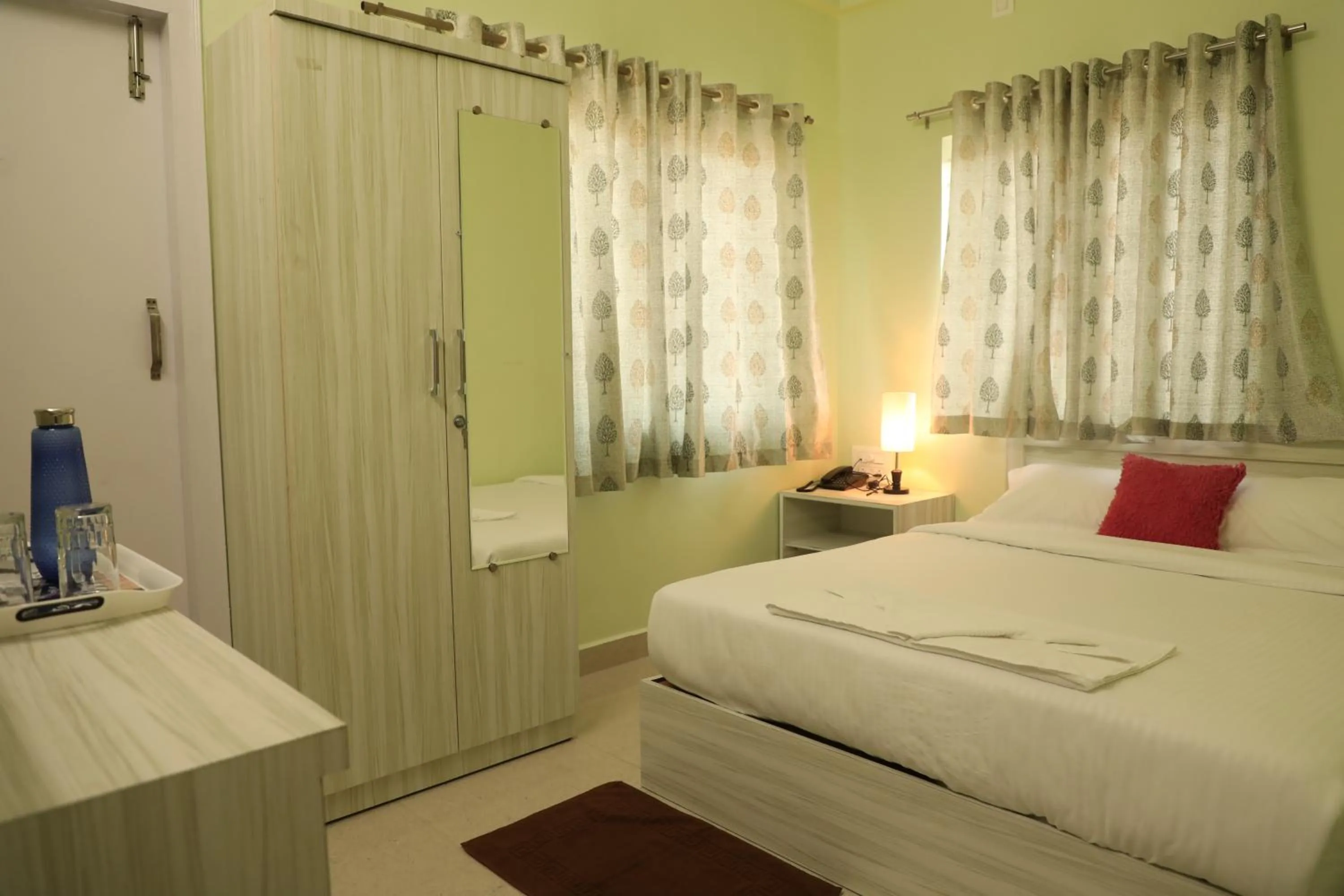 Bedroom, Bed in Sai Inn Mysore
