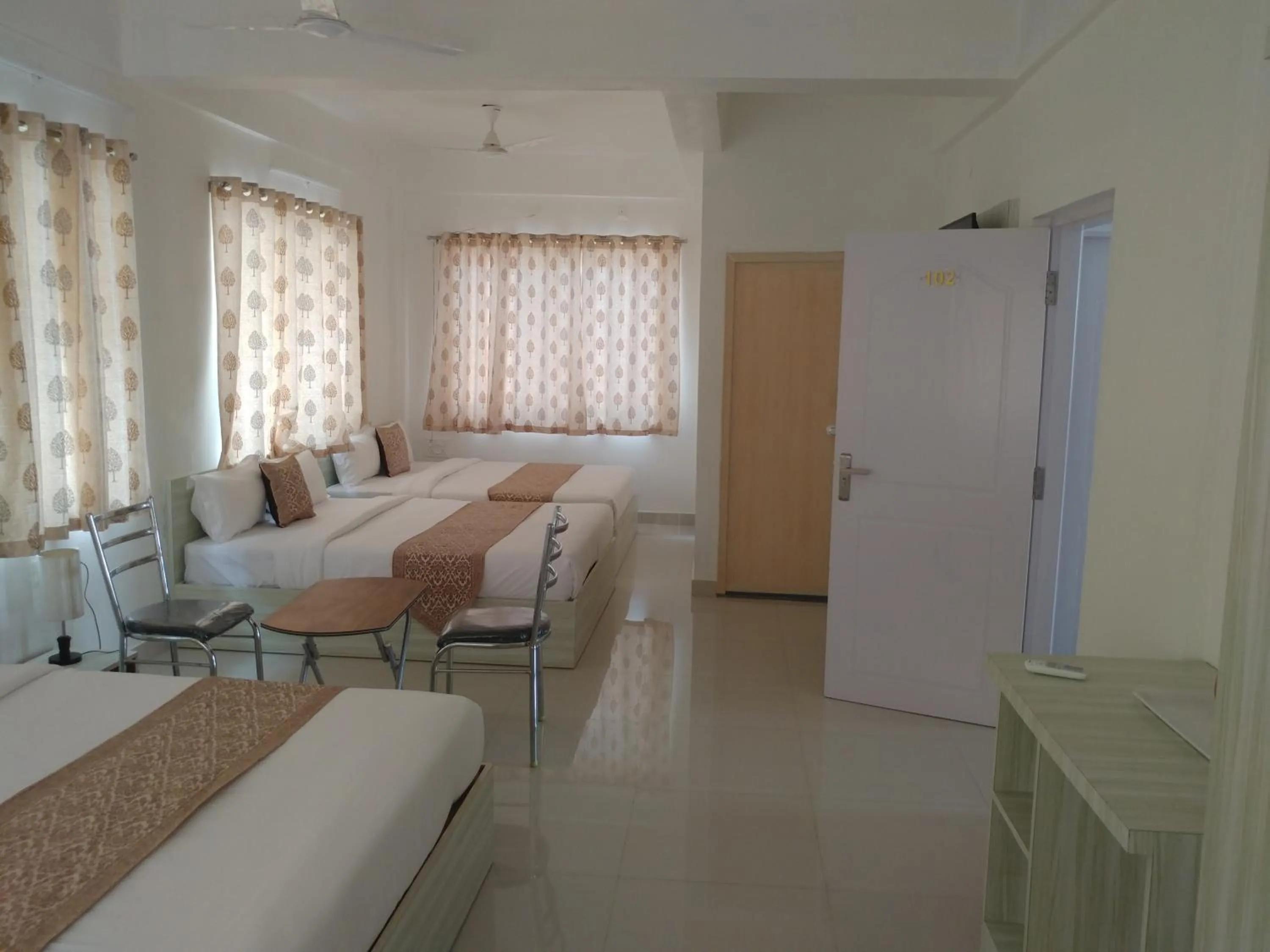 Balcony/Terrace, Bed in Sai Inn Mysore