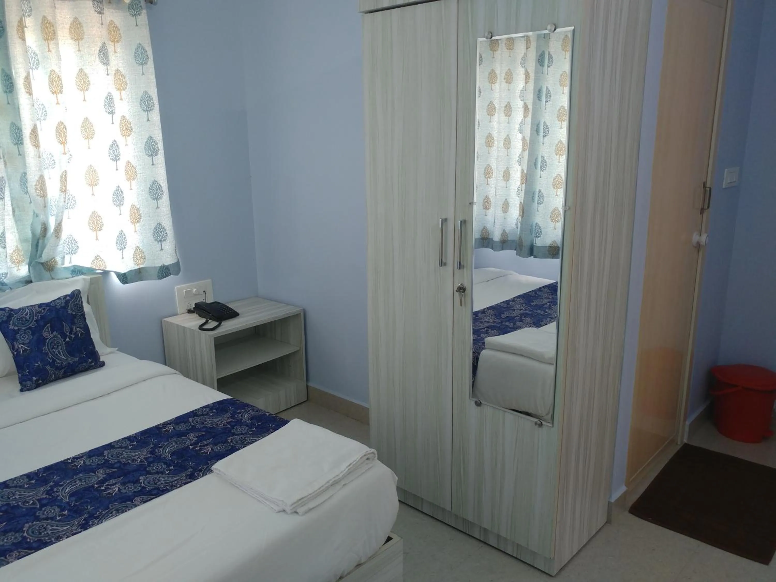 Bedroom, Bed in Sai Inn Mysore