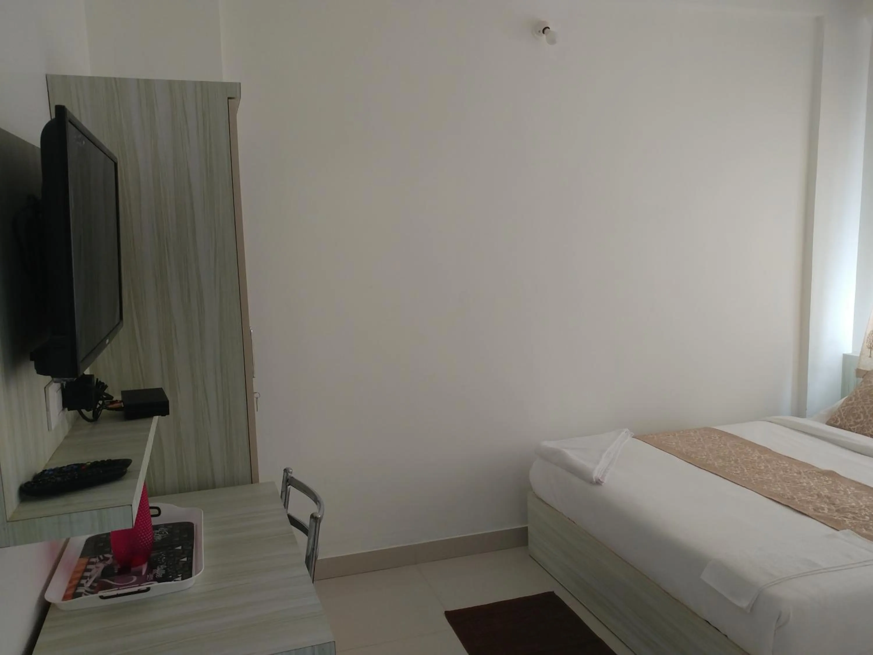 TV and multimedia, Bed in Sai Inn Mysore