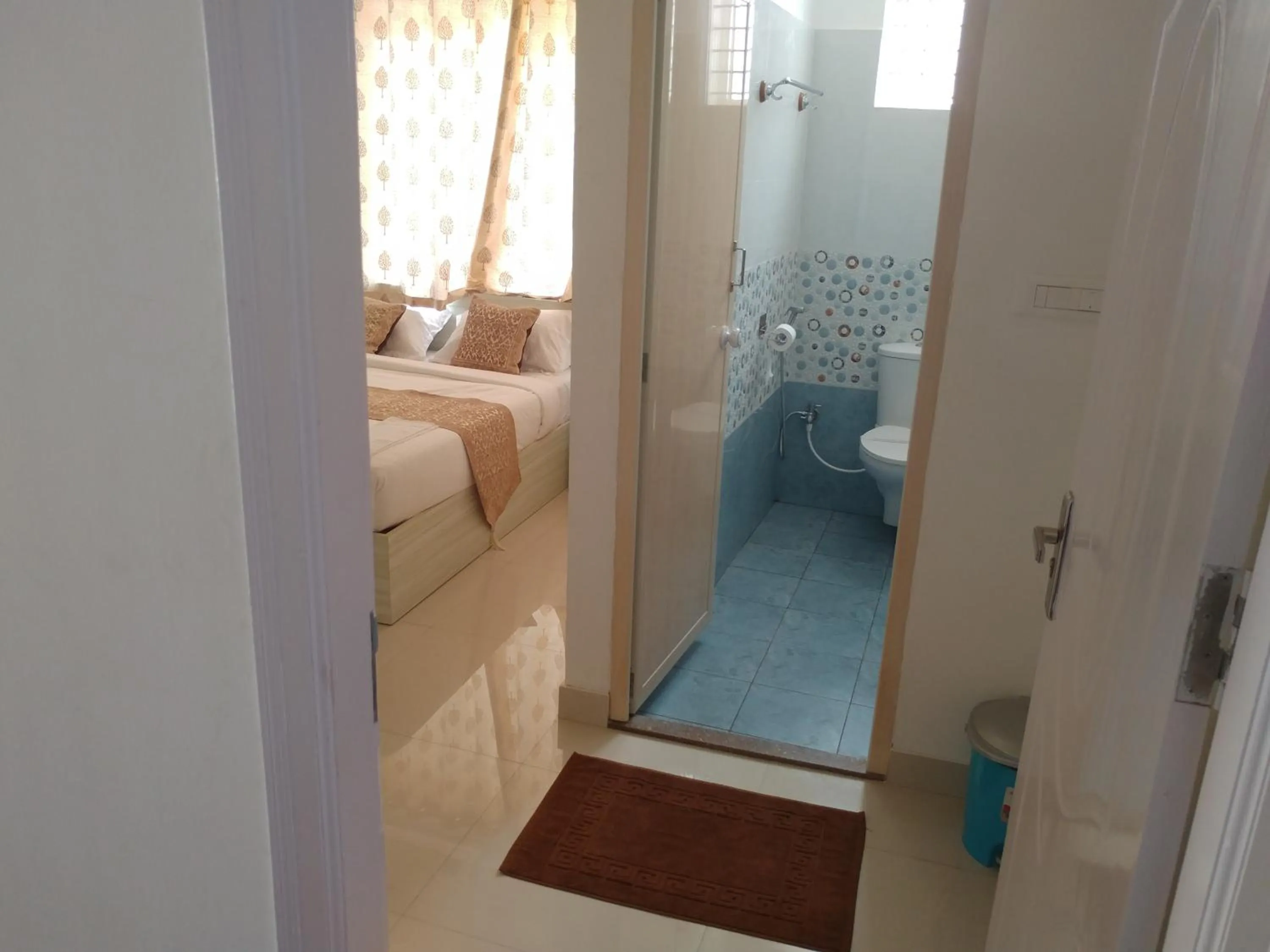 Facade/entrance, Bed in Sai Inn Mysore