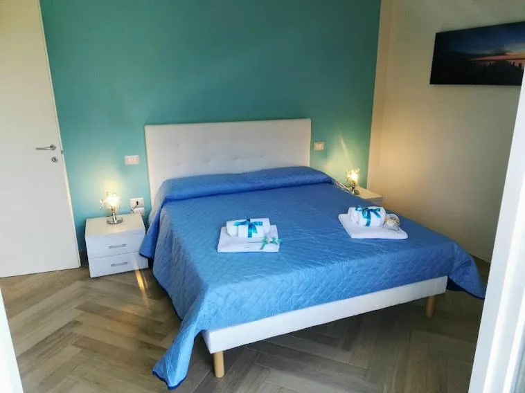 Bed in Il Giglio Marino Cilento Residence by ElodeaGroup