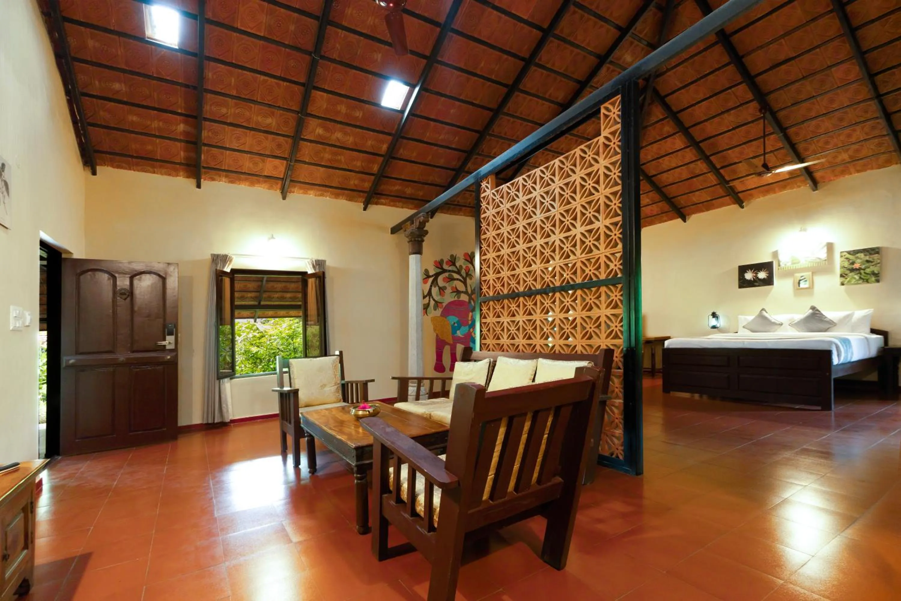 Seating area, Bed in Magnolia Estates & Resorts