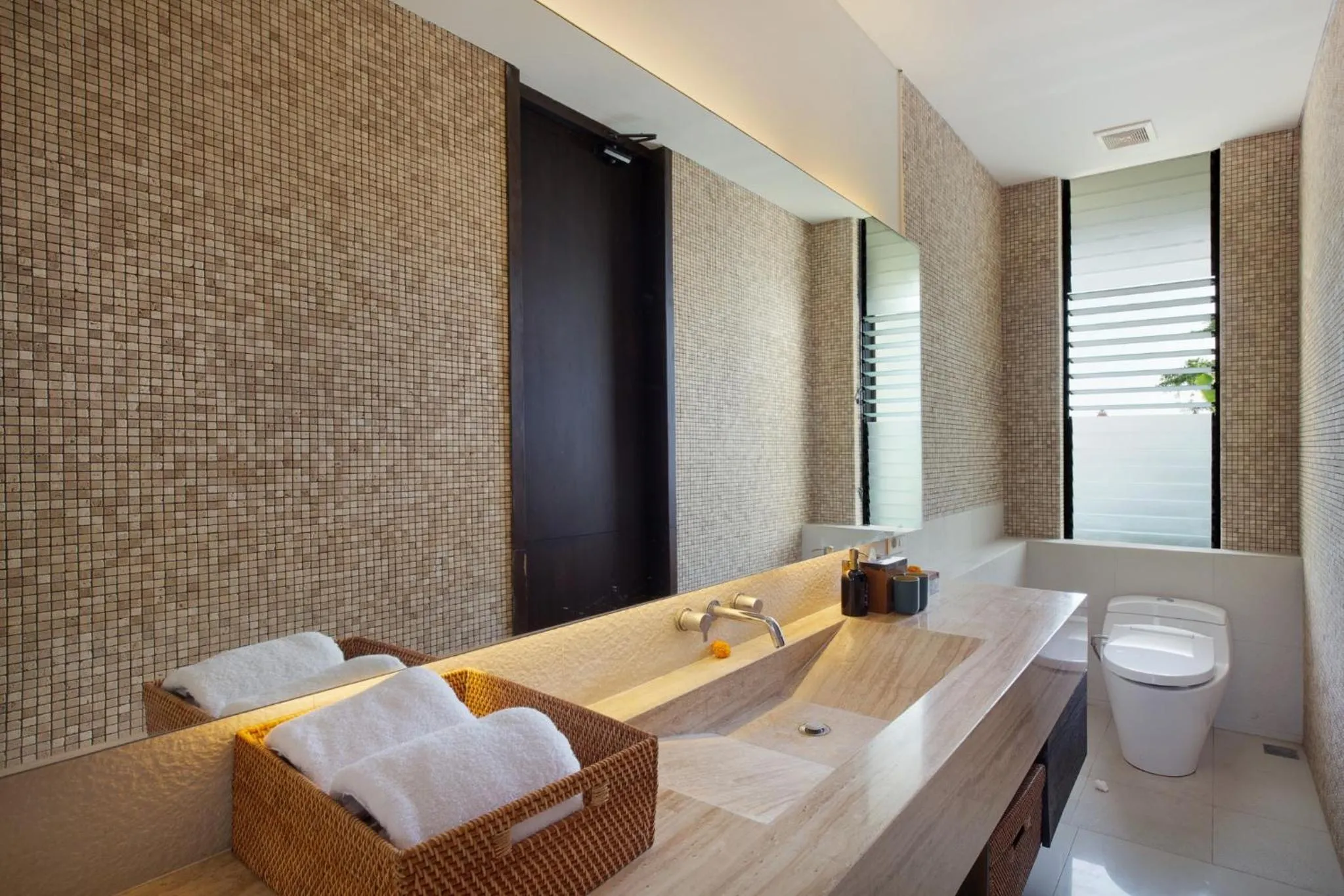 Bathroom in Monolocale Resort & Spa Seminyak by Ini Vie Hospitality