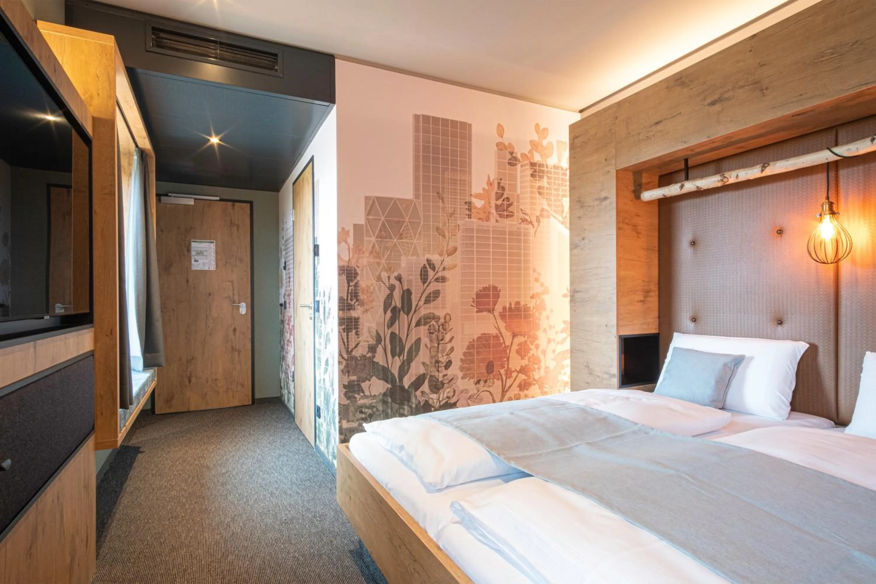 Bed in RiKu HOTEL Reutlingen