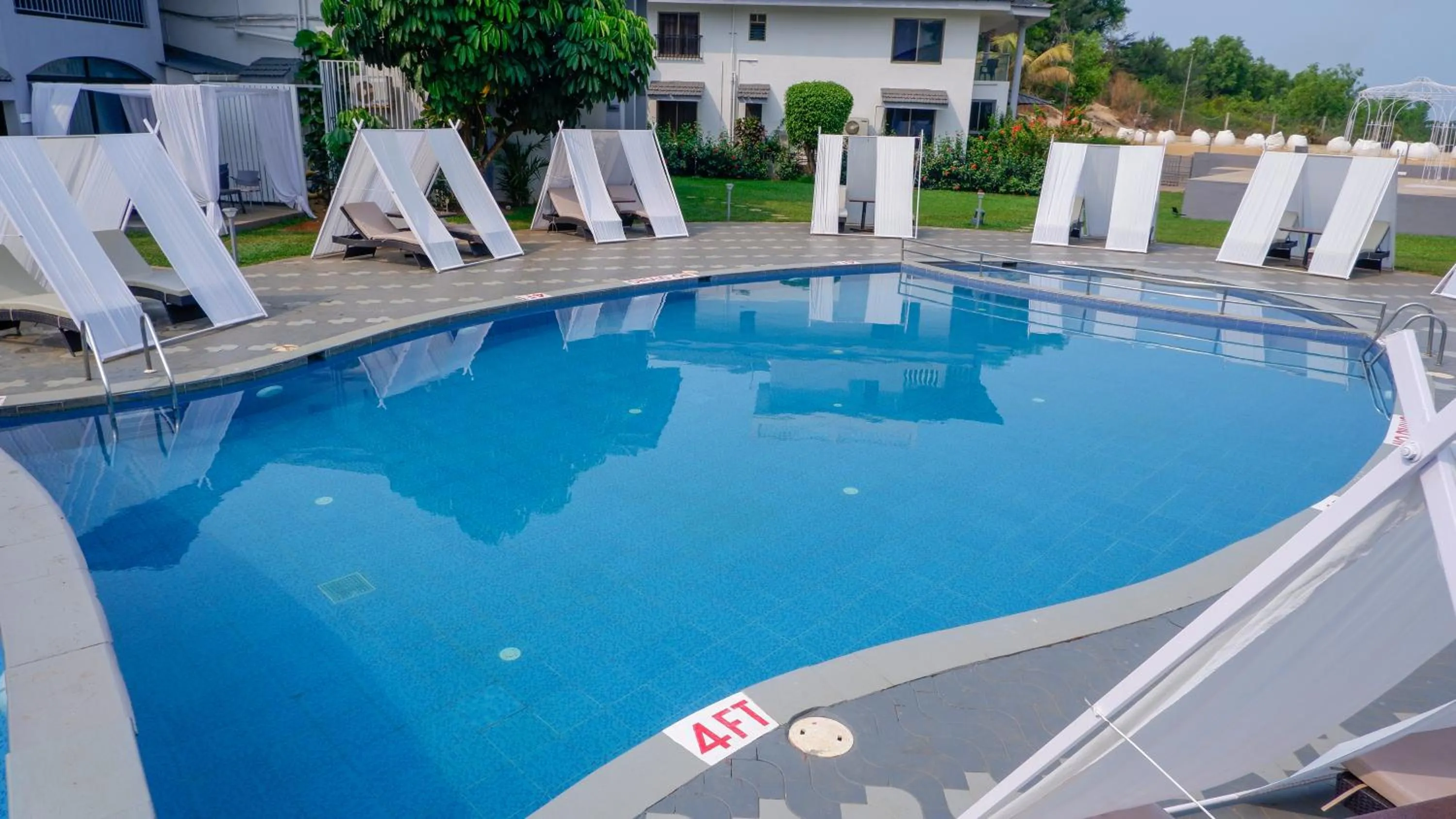 Swimming pool in Regenta Baywatch Resort, Goa