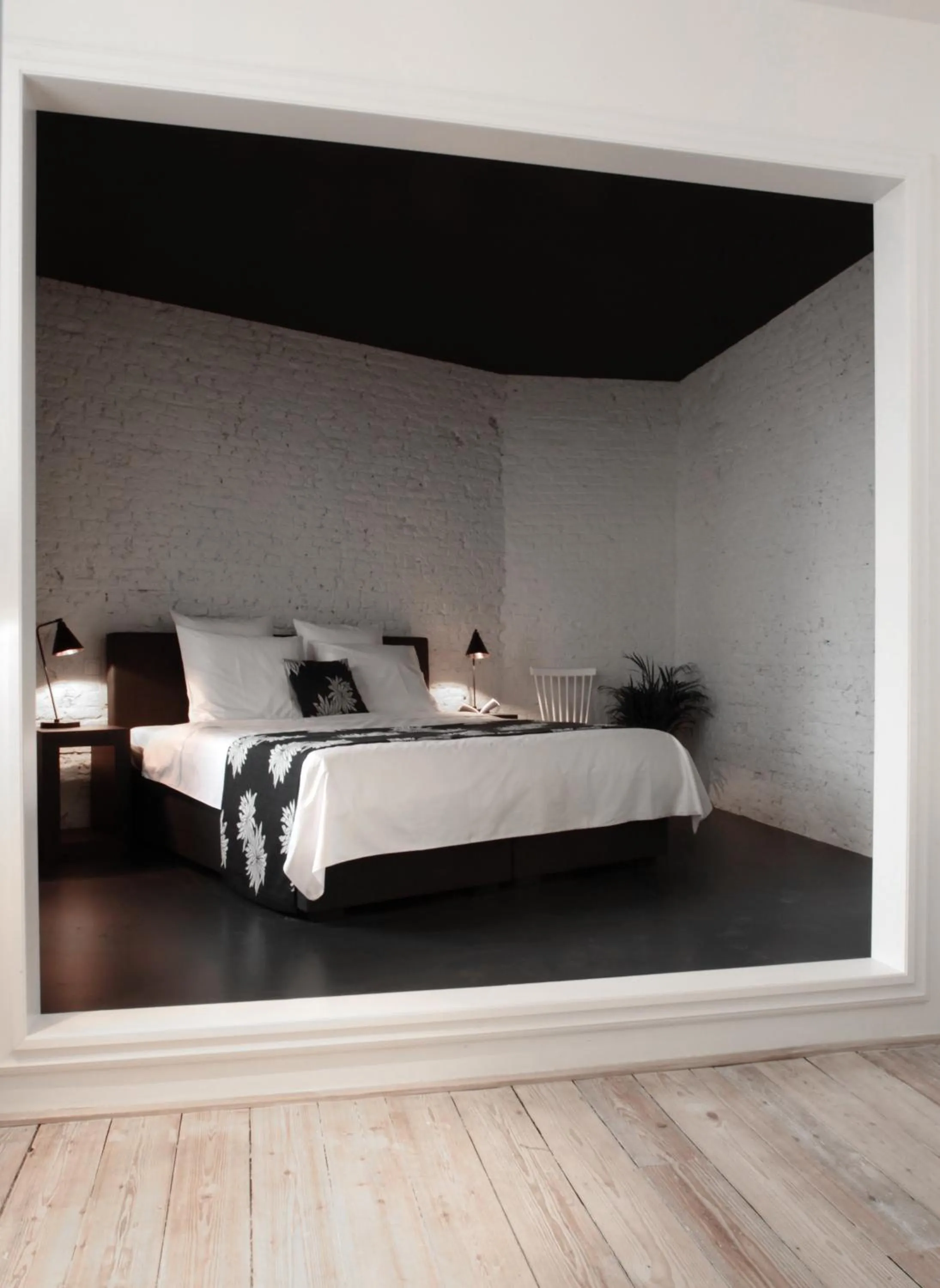 Bed in Maison Nationale City Flats & Suites