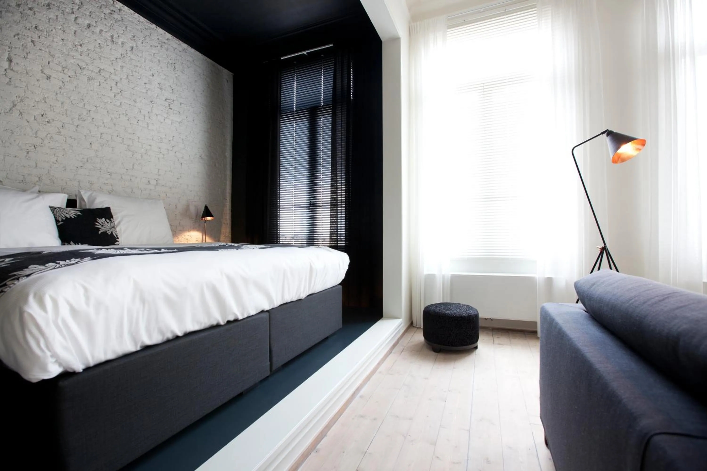 Living room, Bed in Maison Nationale City Flats & Suites