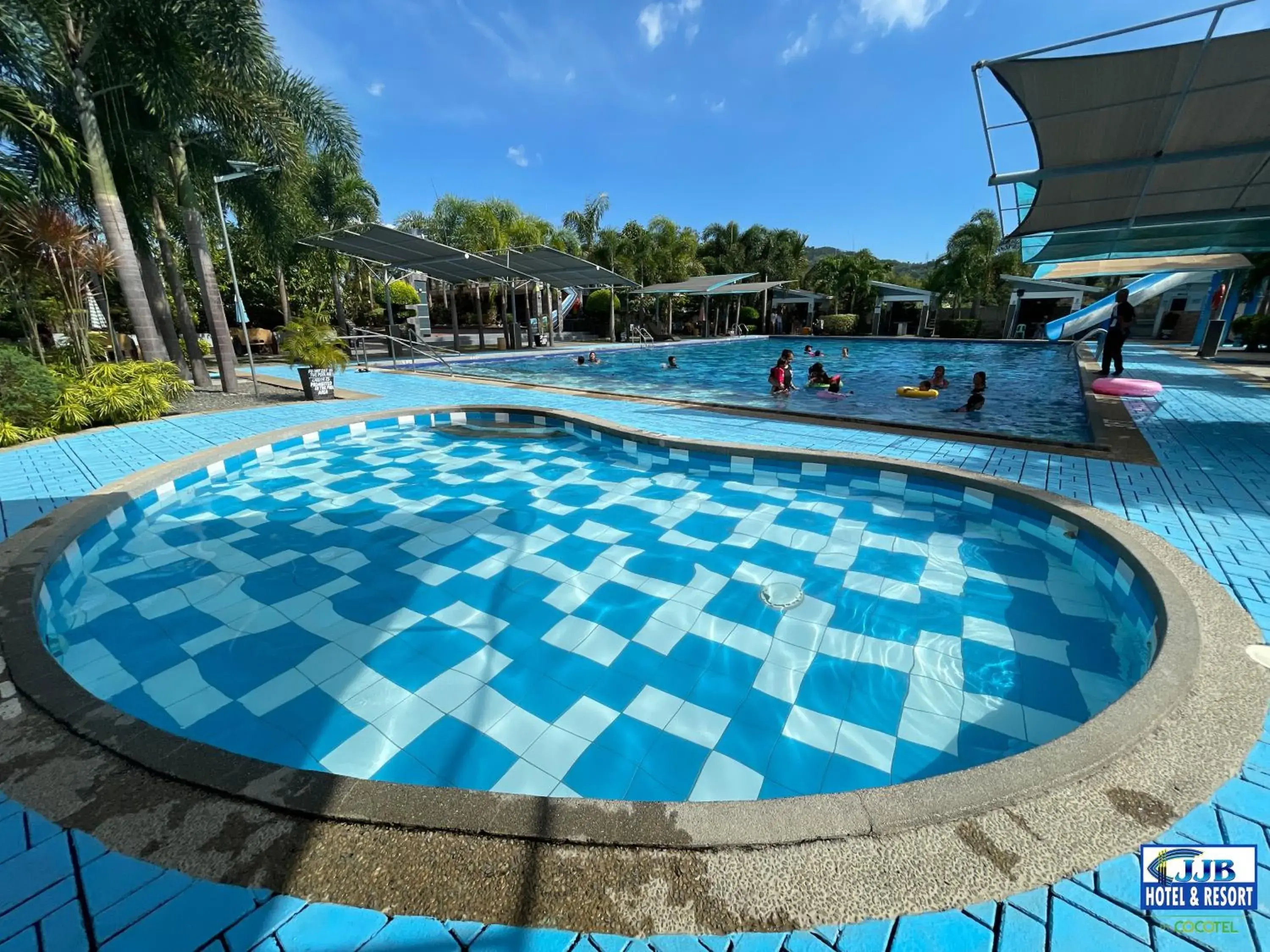 Swimming pool in JJB Aquafarm Resort by Cocotel Swimming pool in JJB Aquafarm Resort by Cocotel