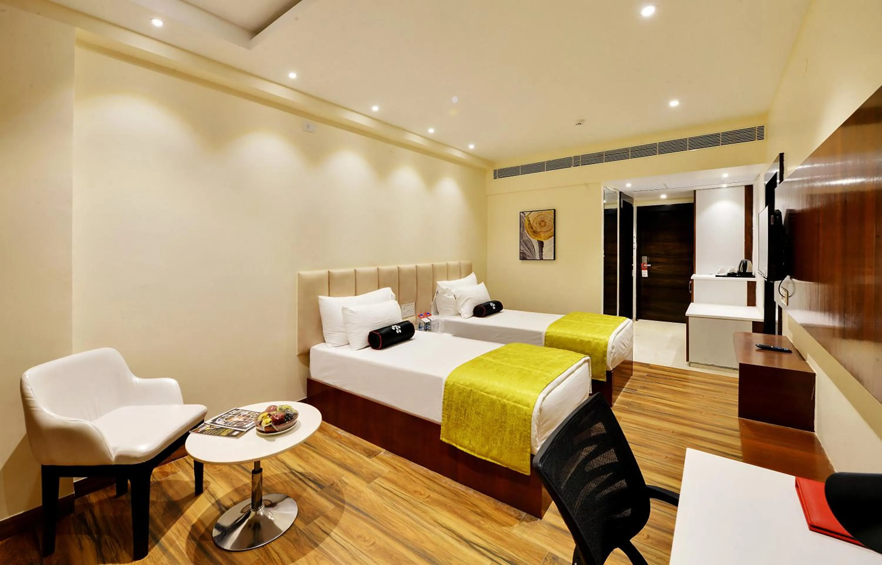 Bed in Mastiff Select Gulbarga Hotel