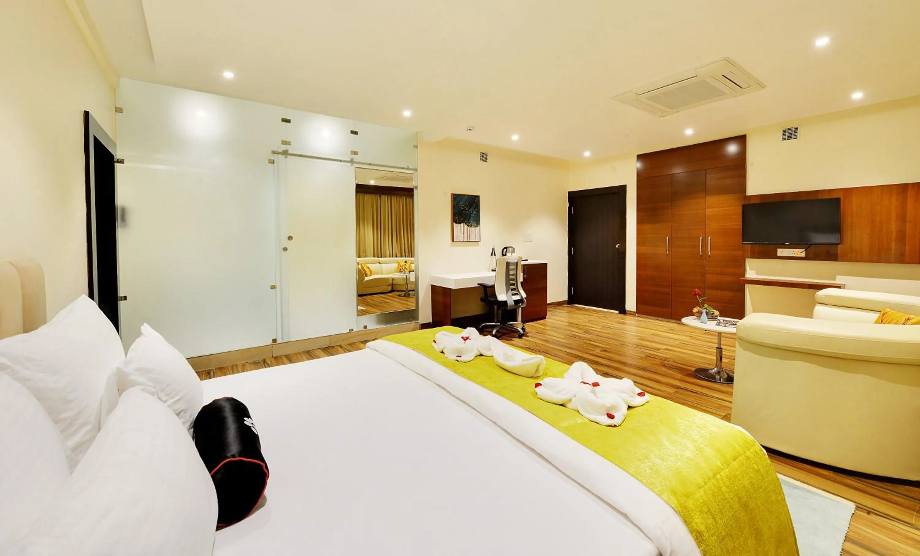 Bed in Mastiff Select Gulbarga Hotel