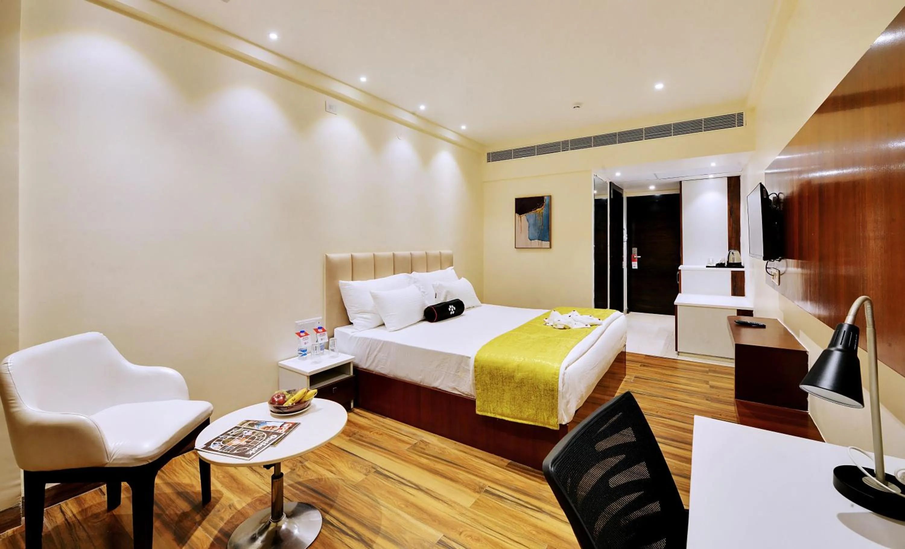 Bed in Mastiff Select Gulbarga Hotel