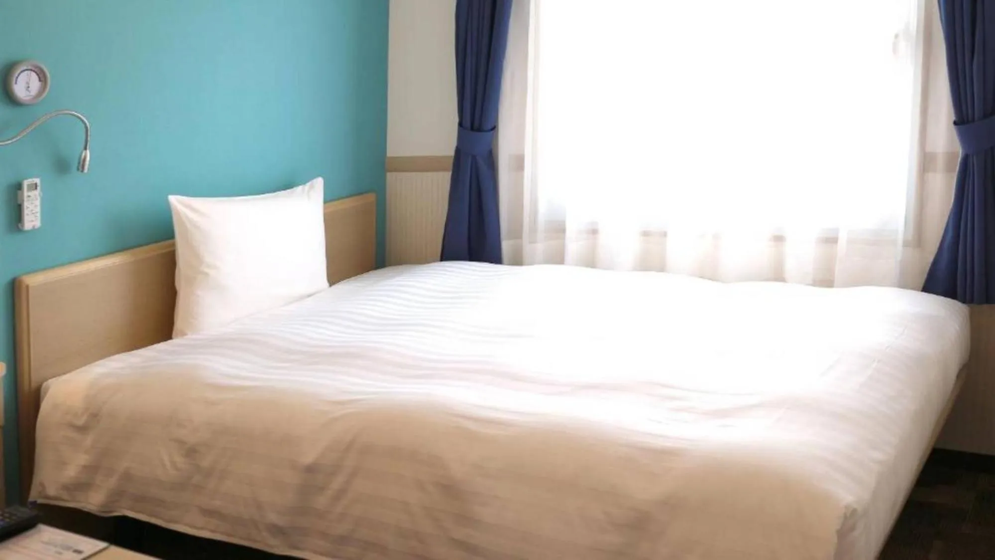 Photo of the whole room, Bed in Toyoko Inn Yokohama Shiei-chikatetsu Center Minami-eki