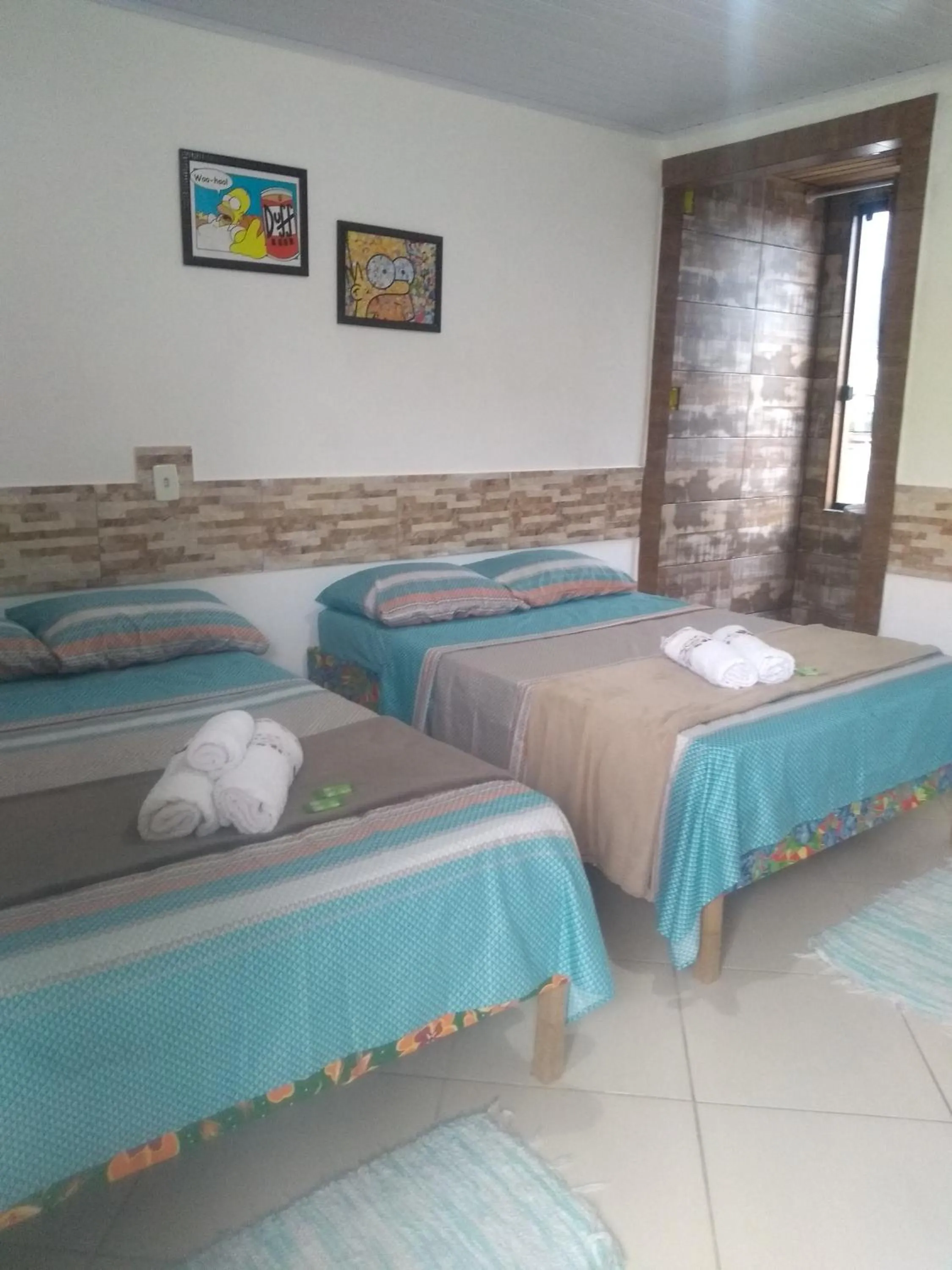 Bed in Pousada Vó Nita
