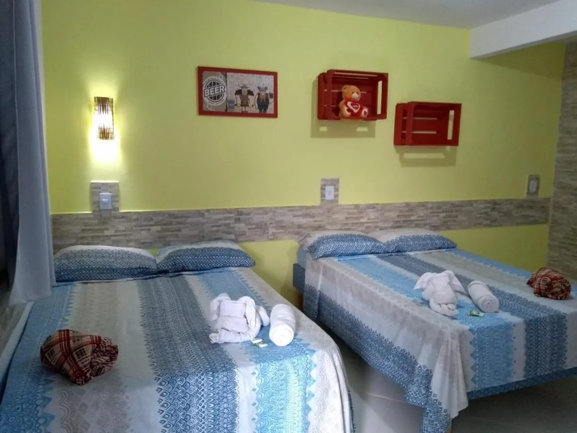 Bed in Pousada Vó Nita