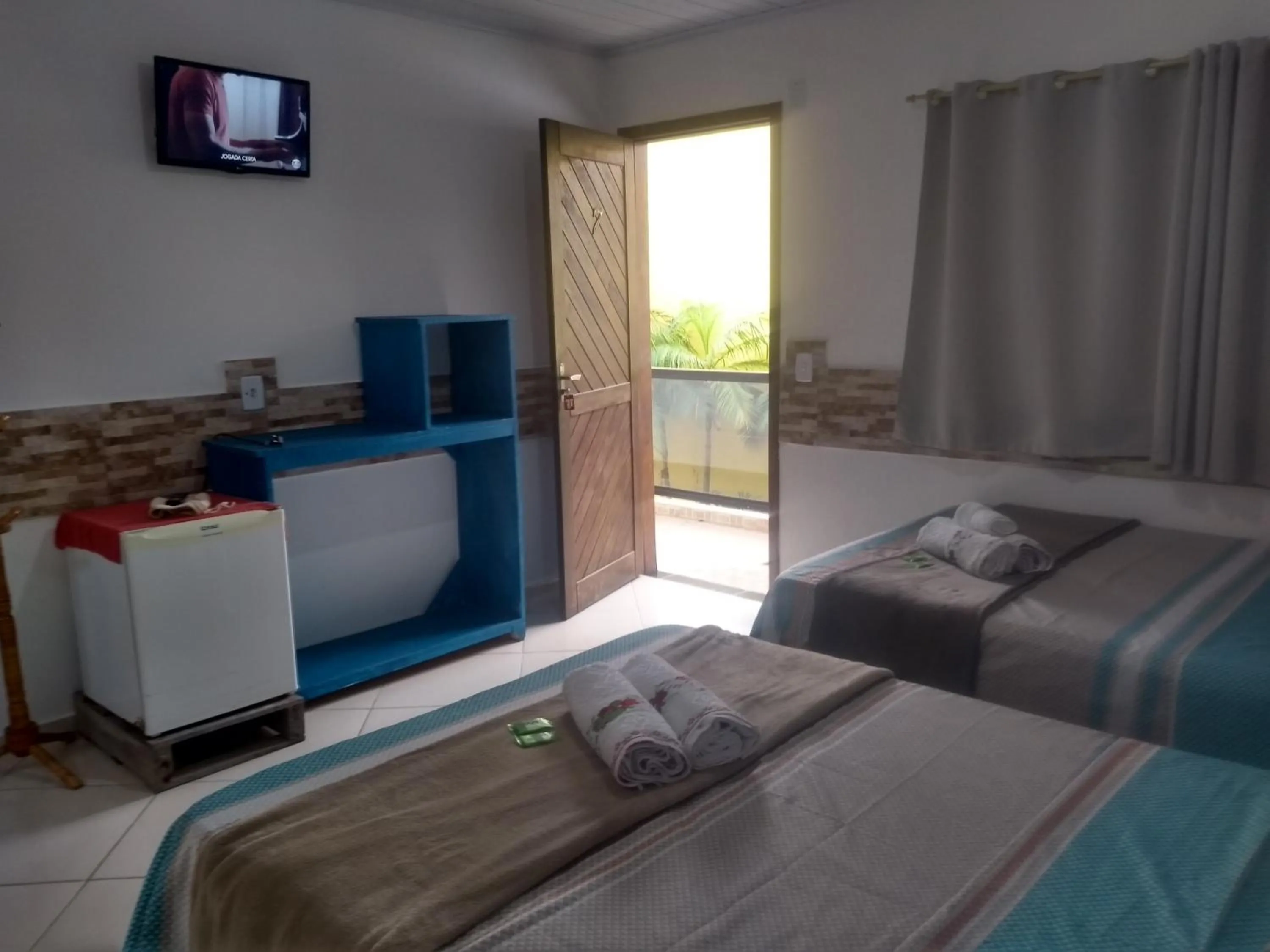 Bed in Pousada Vó Nita