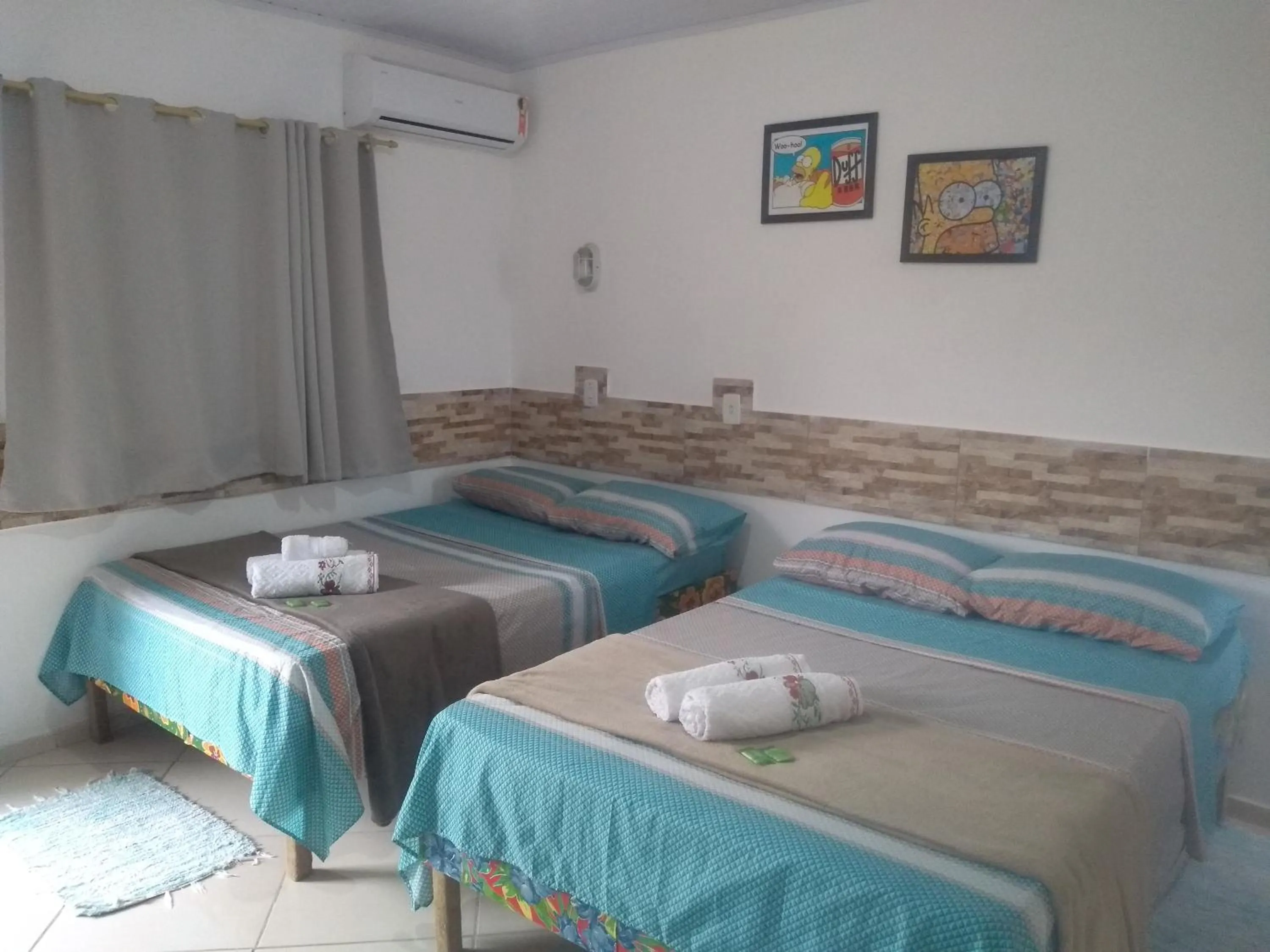 Bed in Pousada Vó Nita