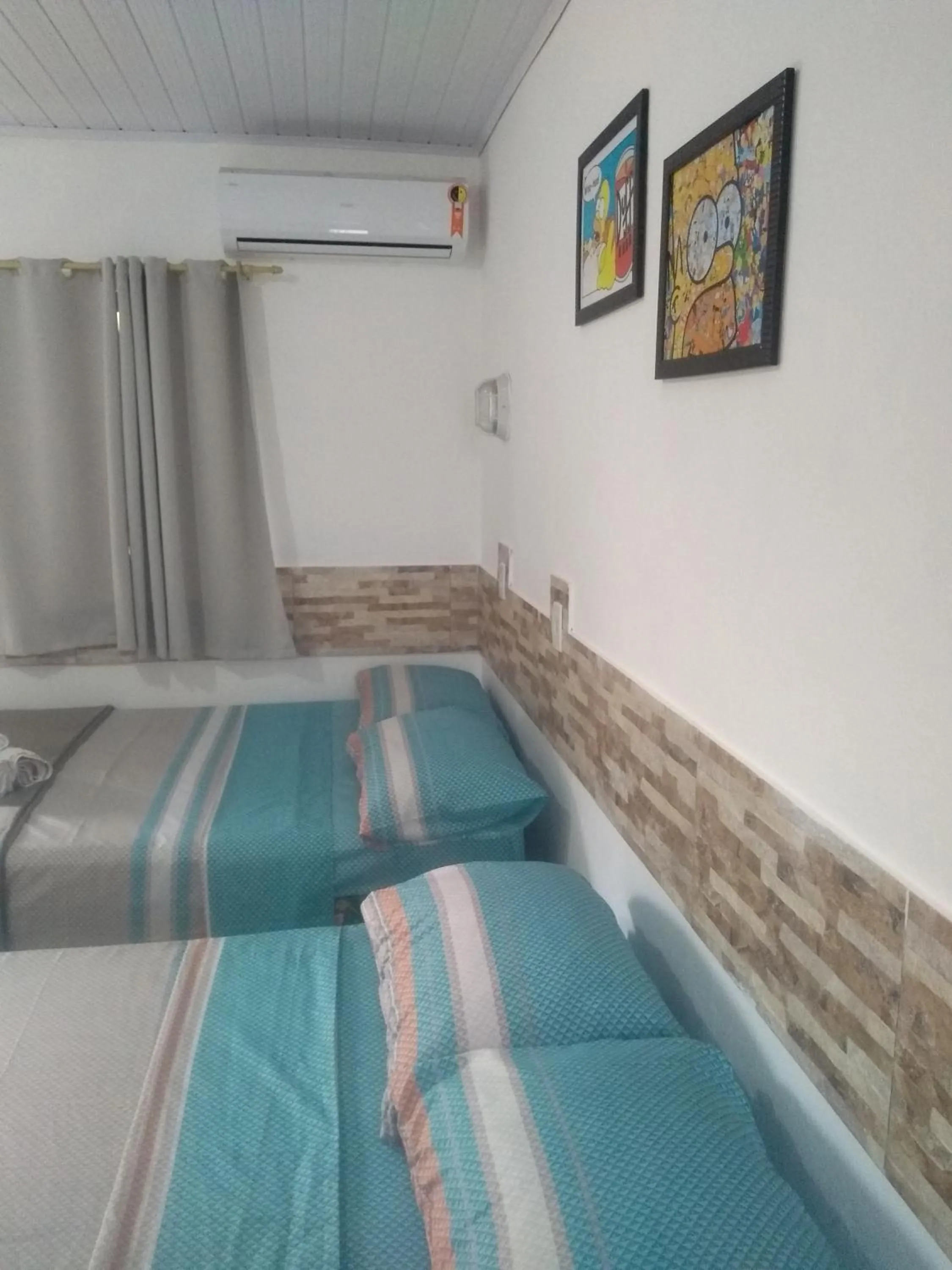 Bed in Pousada Vó Nita