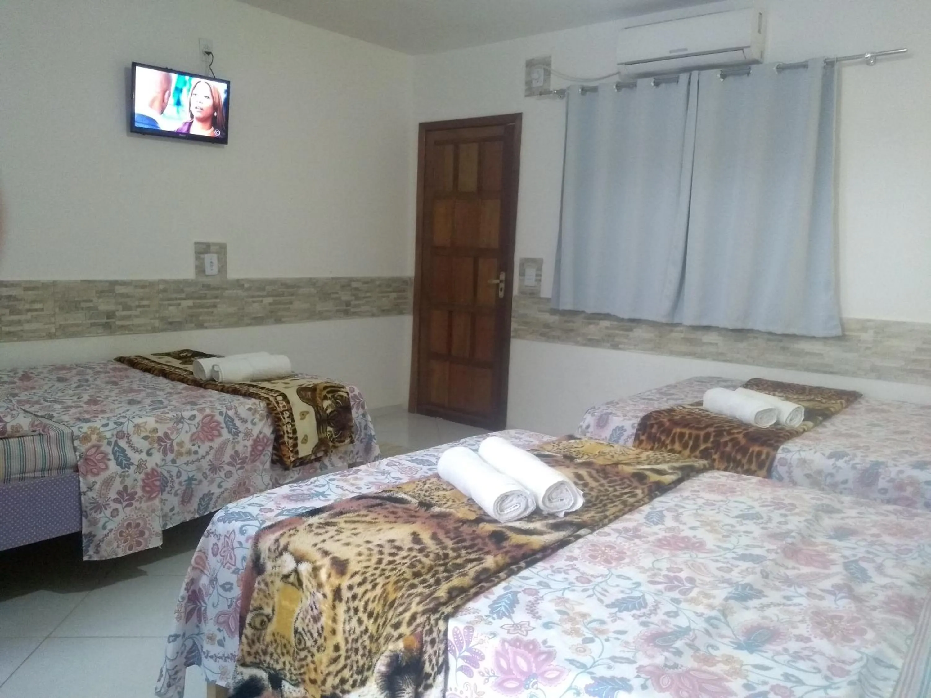 Bed in Pousada Vó Nita