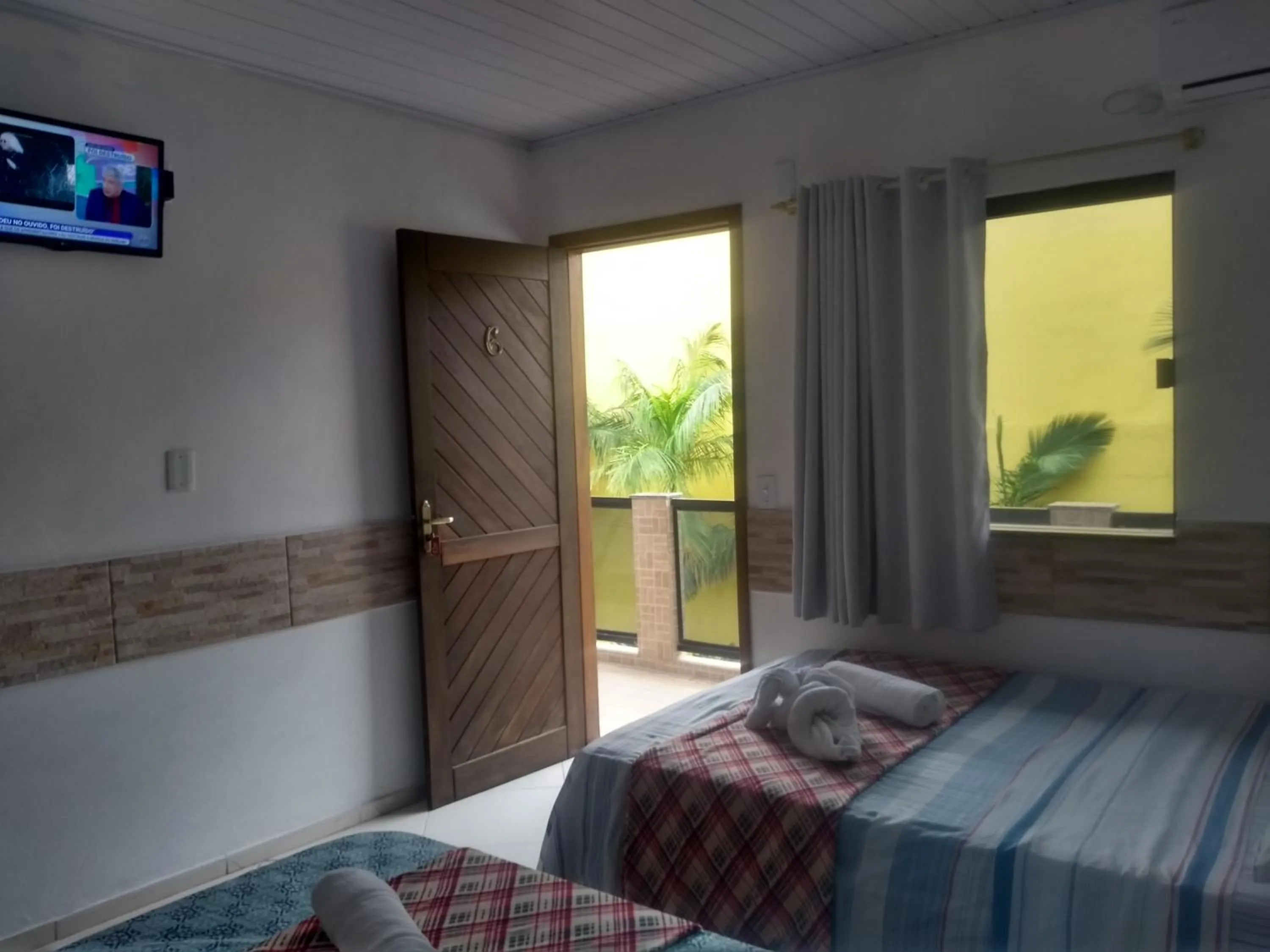 Bed in Pousada Vó Nita