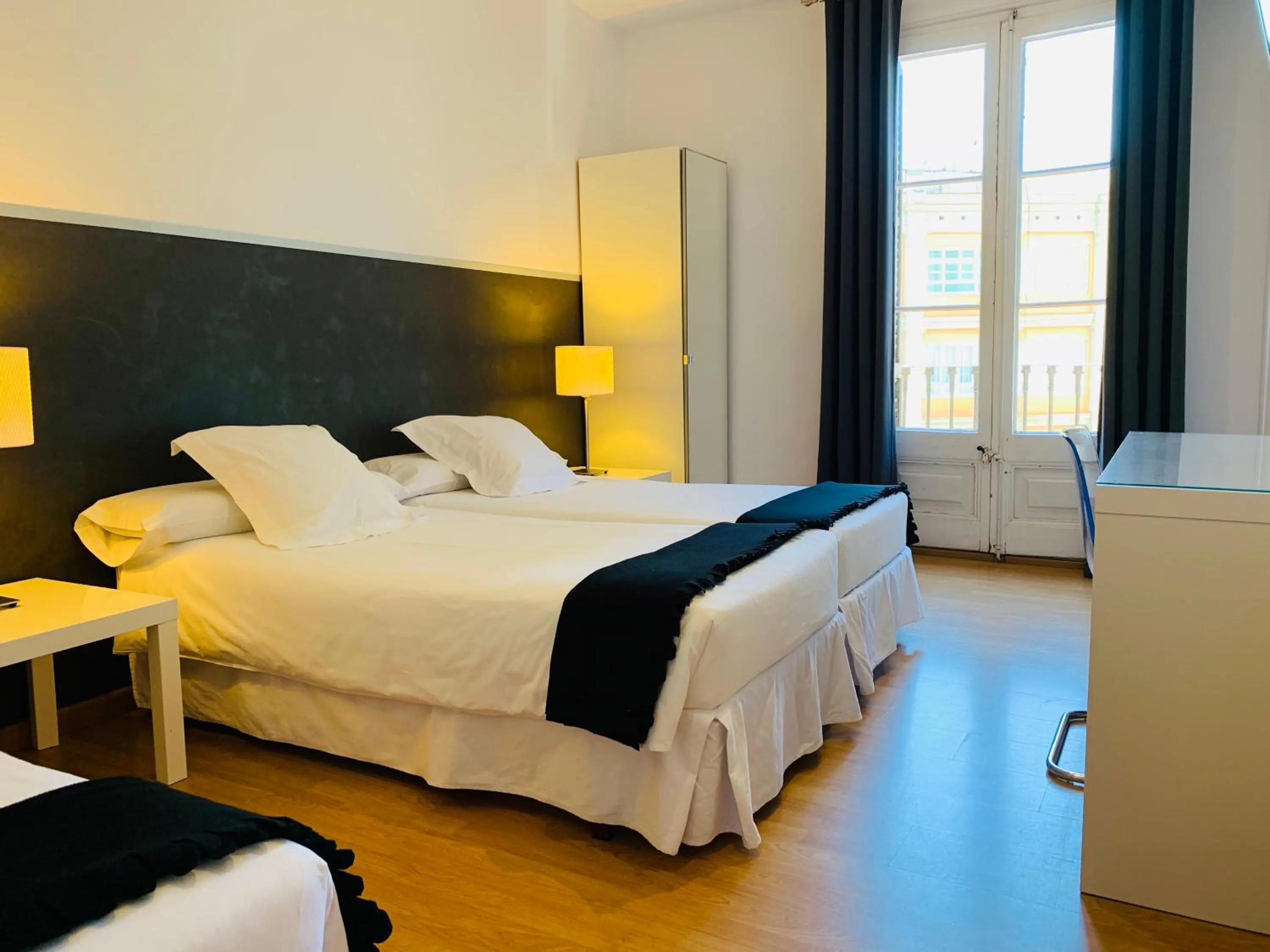 Bed in Super Balmes Guest House