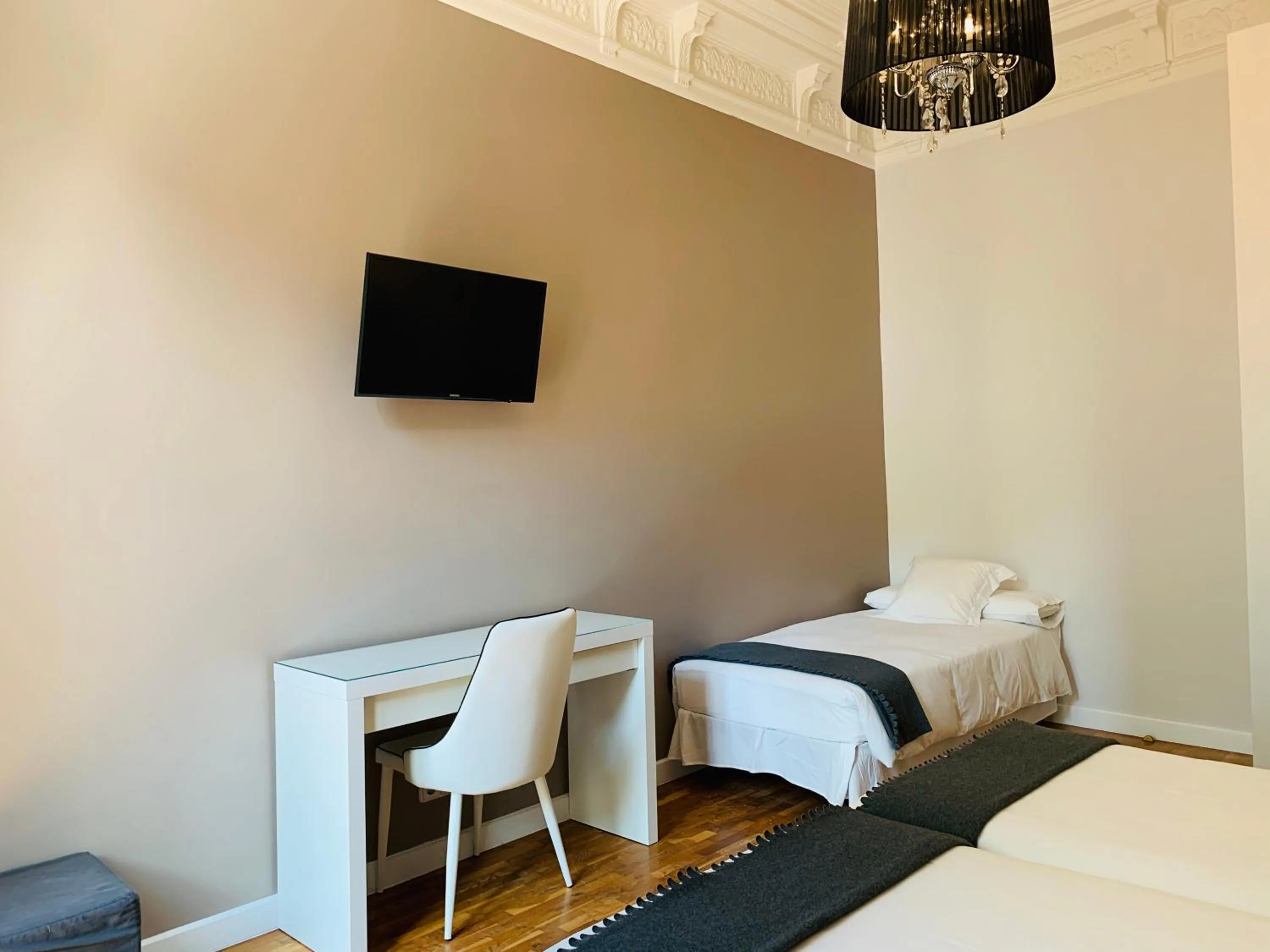 Bed in Super Balmes Guest House