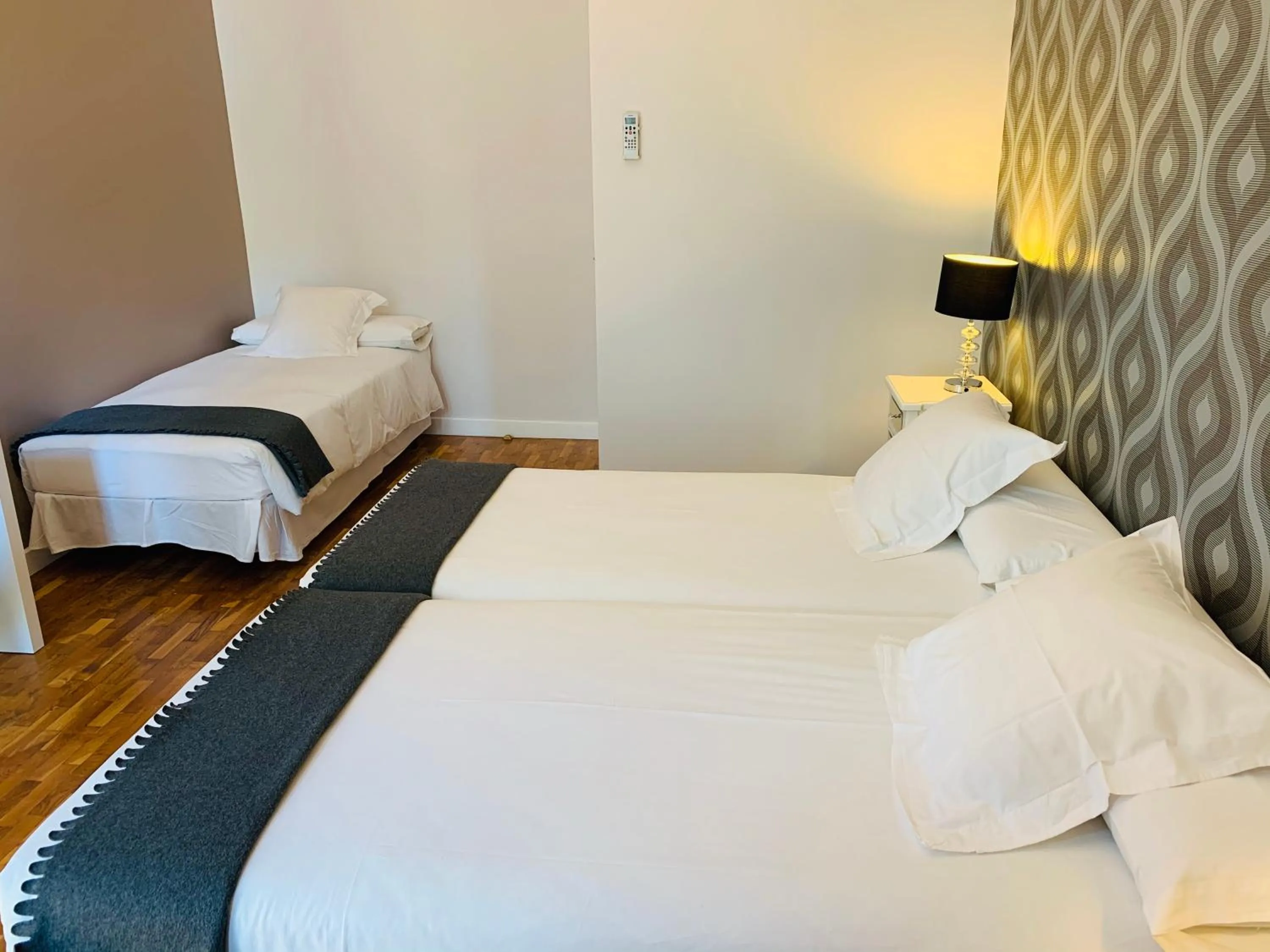 Bed in Super Balmes Guest House