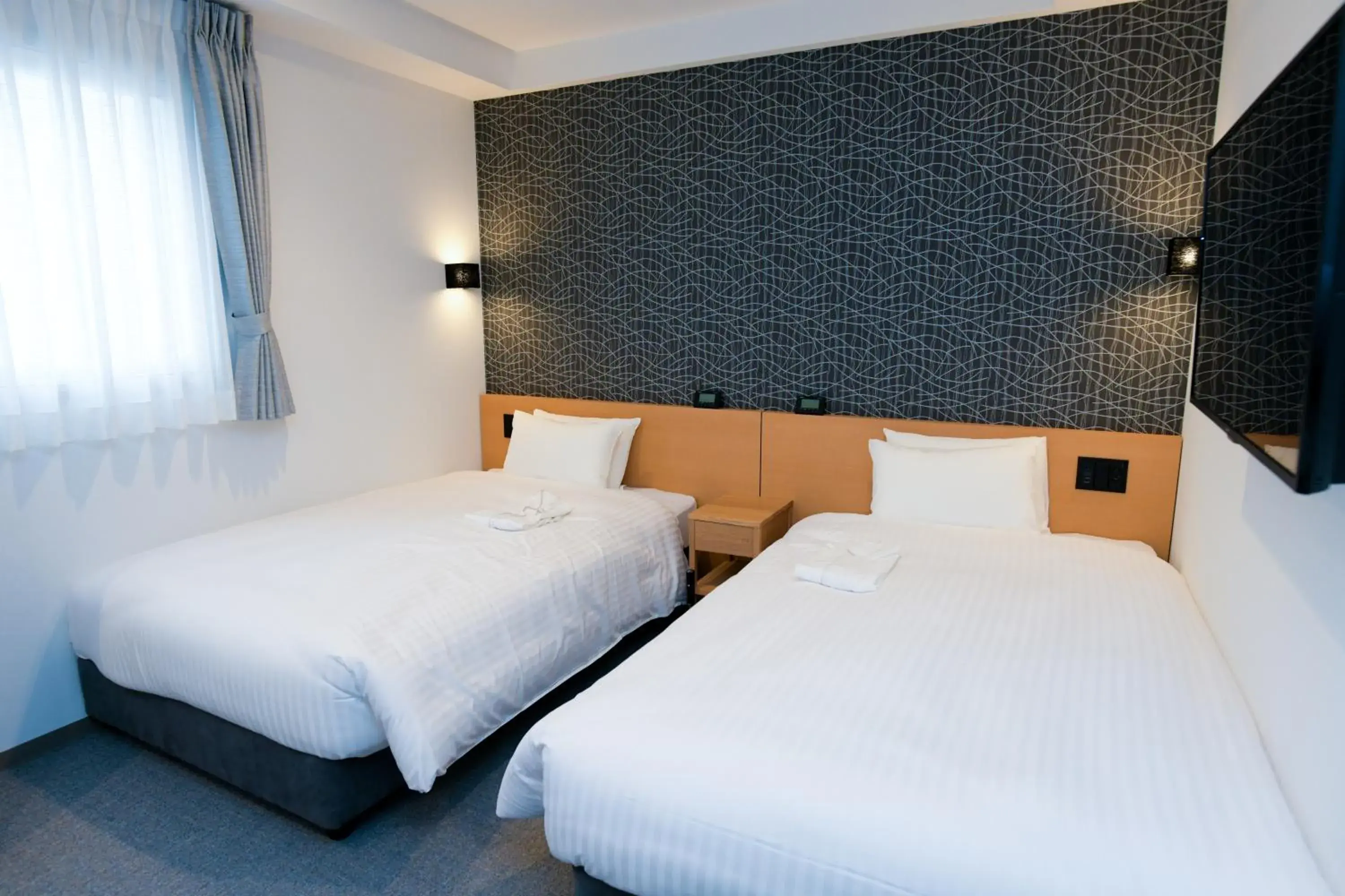 Bed in YOU STYLE HOTEL HAKATA Bed in YOU STYLE HOTEL HAKATA