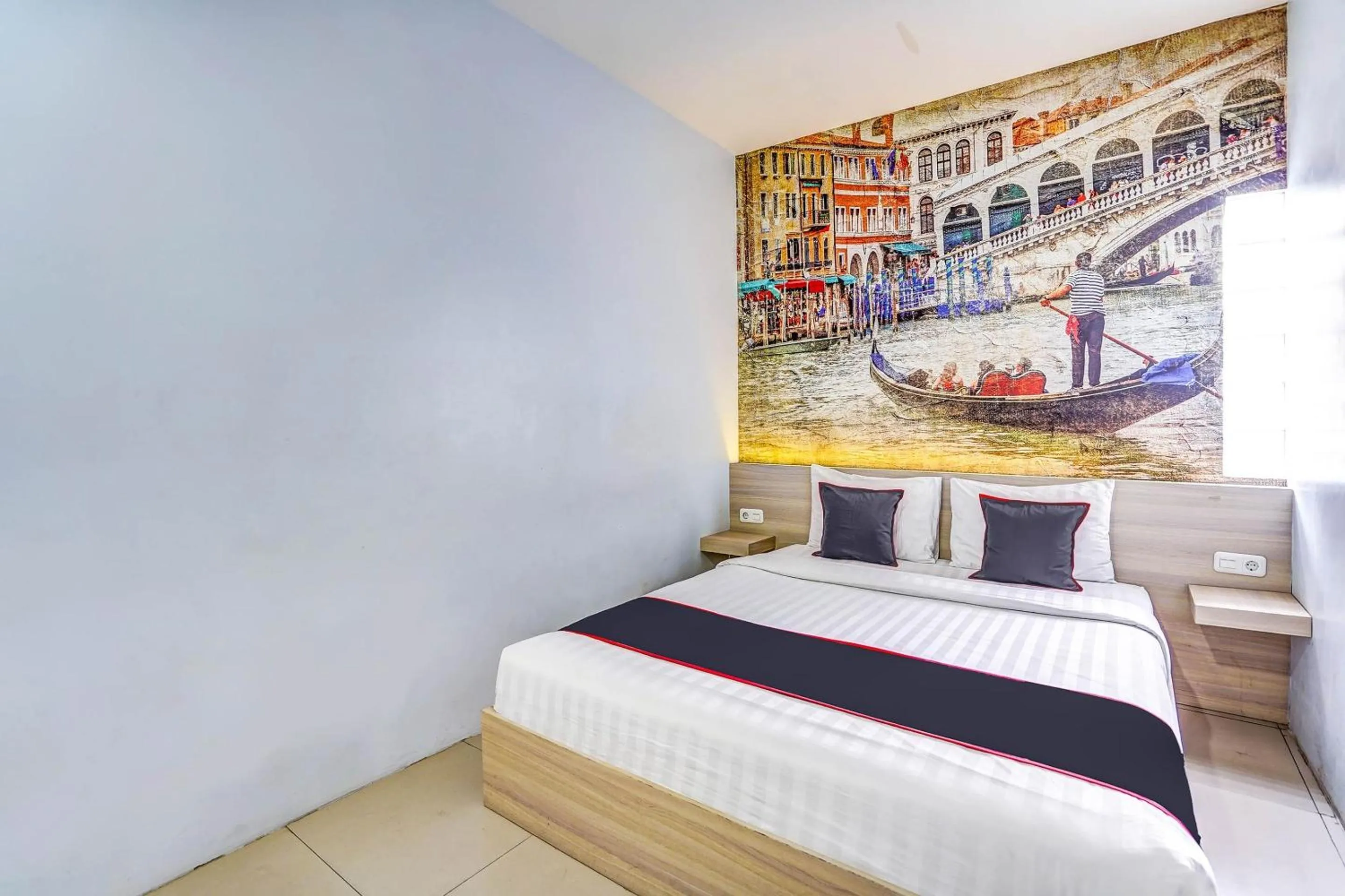 Bedroom in Capital O 90888 Bintang Diponggo Residence