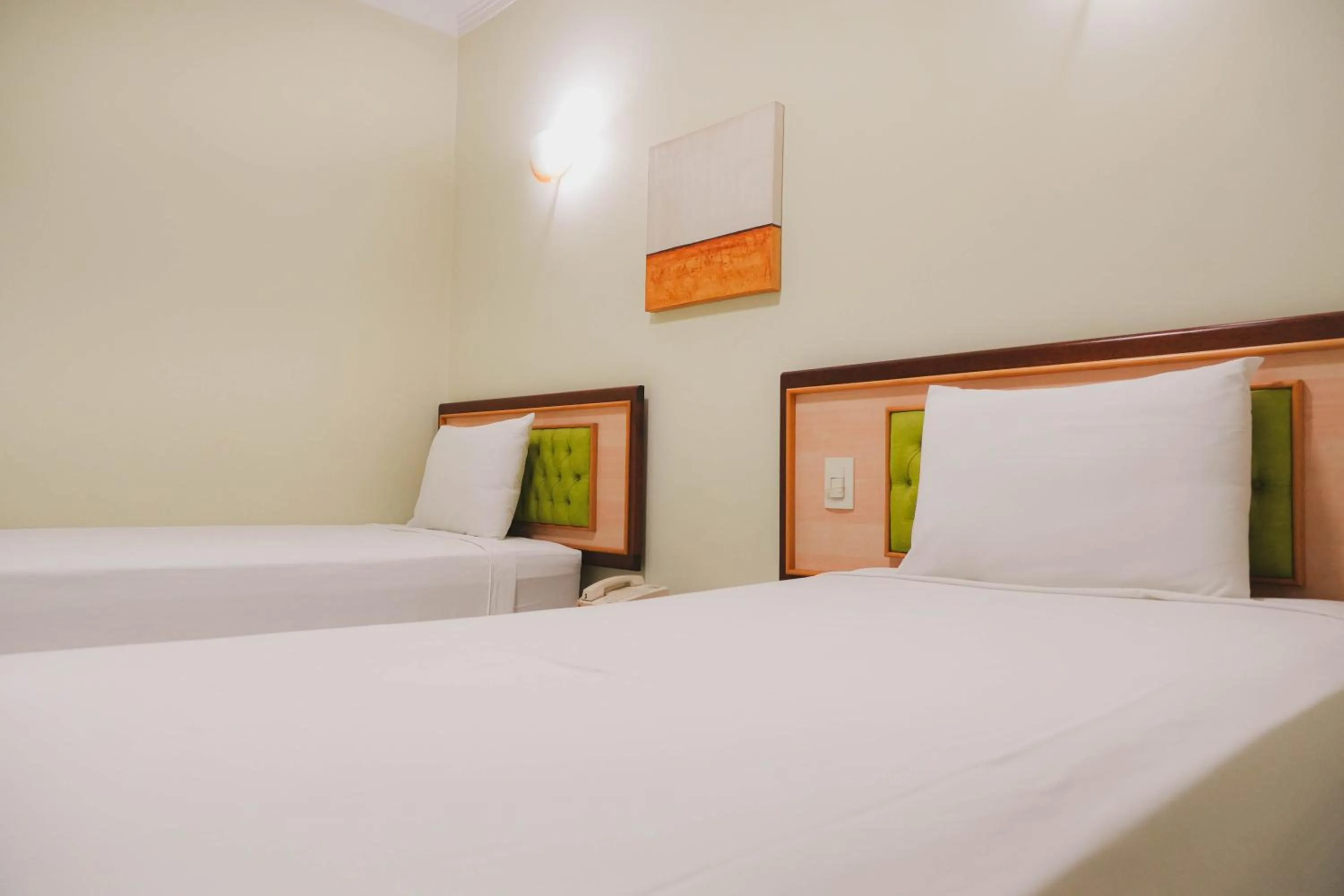 Bed in Larison Ji-Paraná by - Easy Hotéis