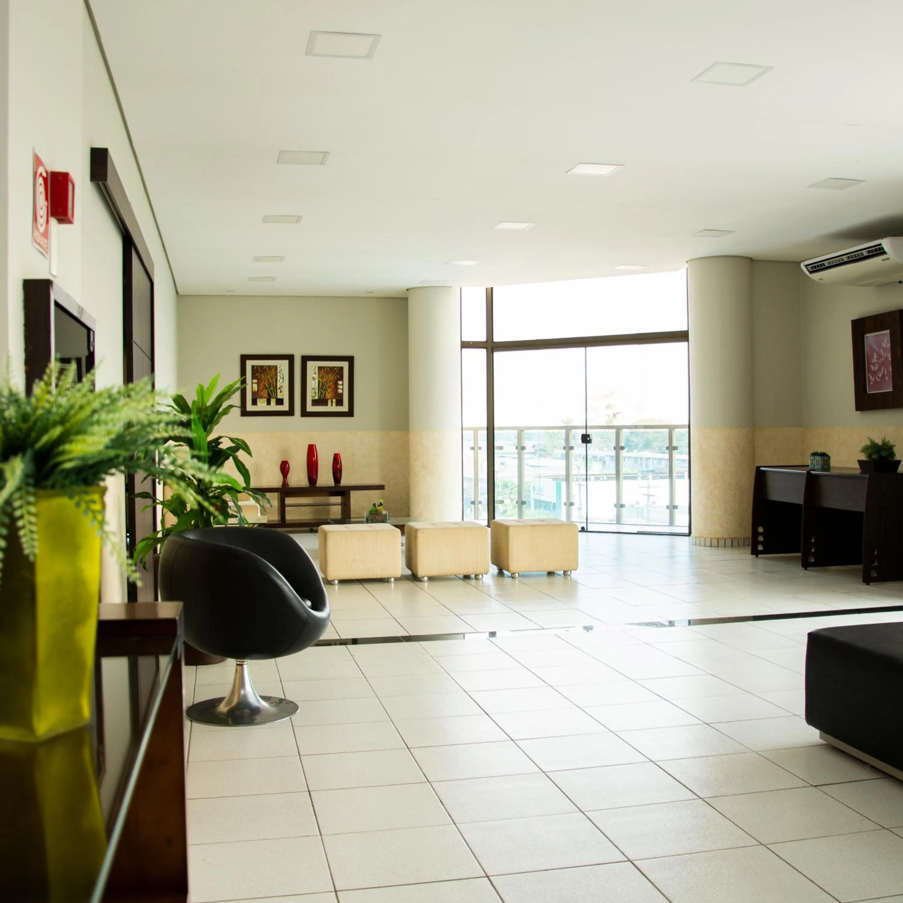 Seating area in Larison Ji-Paraná by - Easy Hotéis