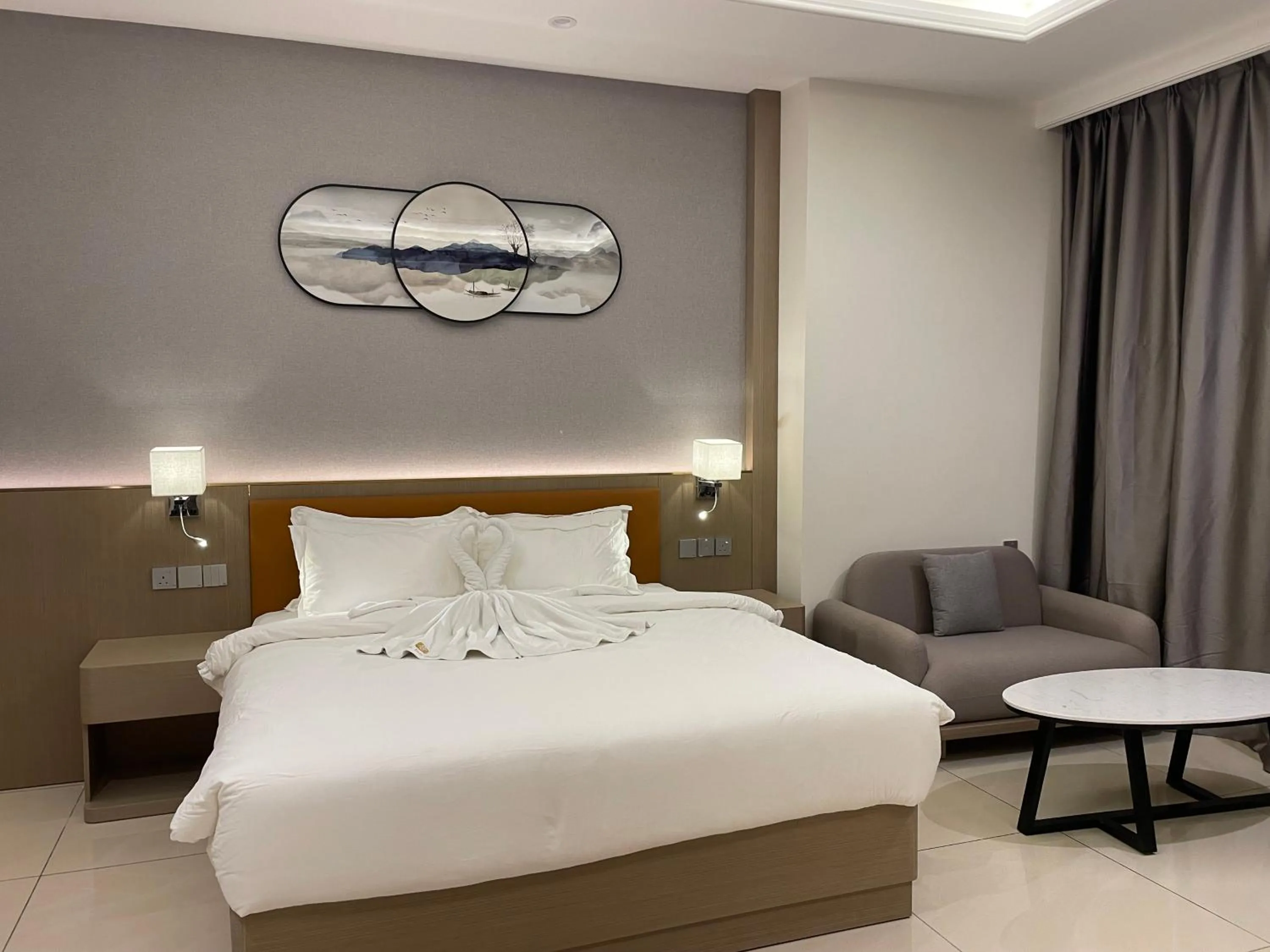 Bed in Season Inn Hotel_Al Hail
