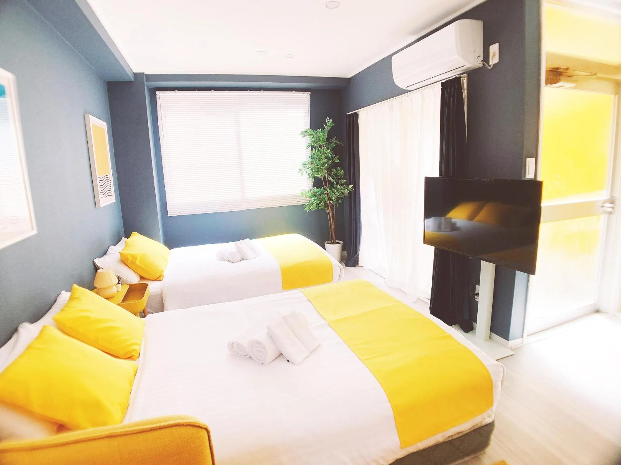 Bed in OUCHI HOTEL Nagarekawa with Dogs