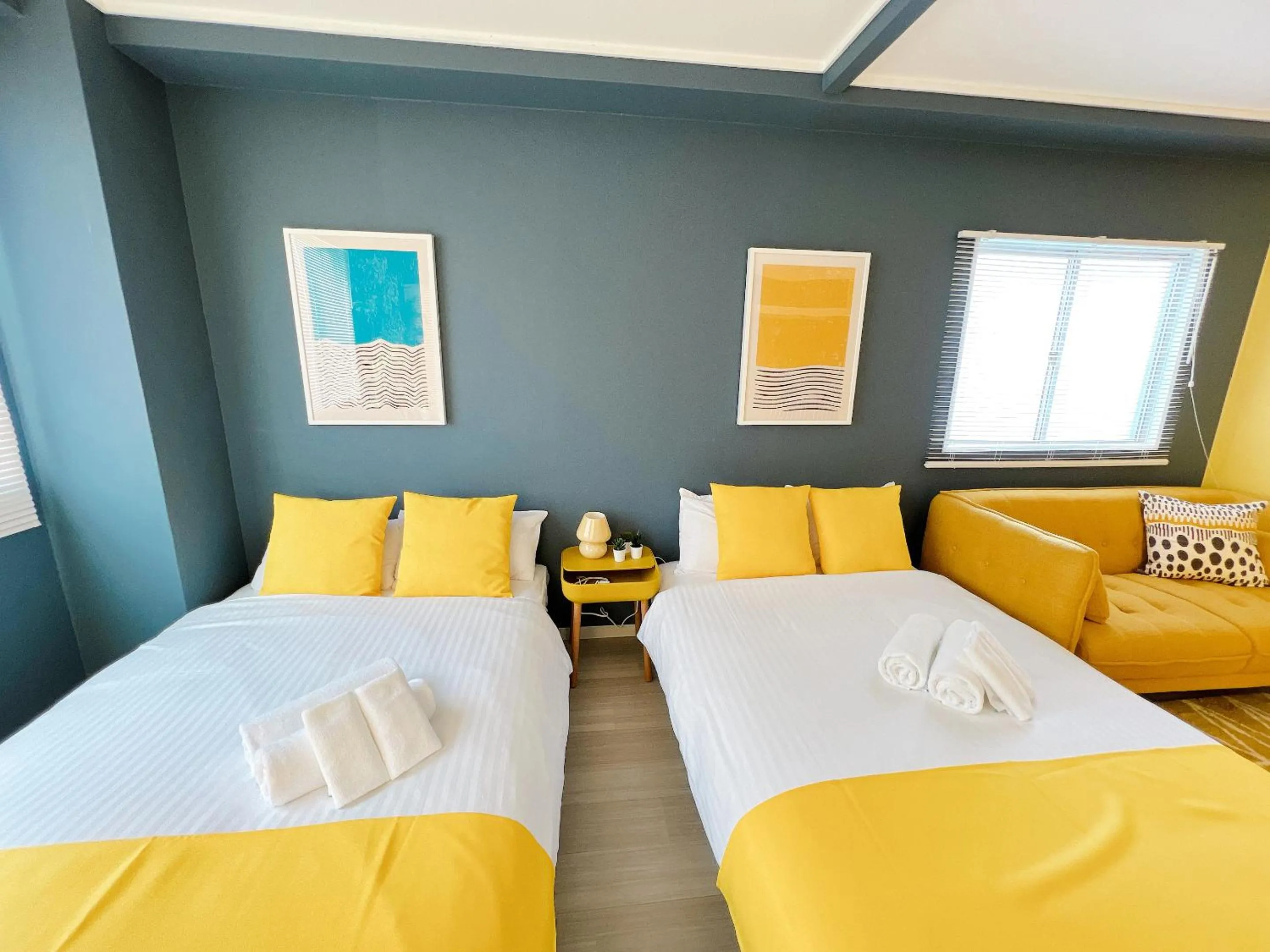 Bed in OUCHI HOTEL Nagarekawa with Dogs